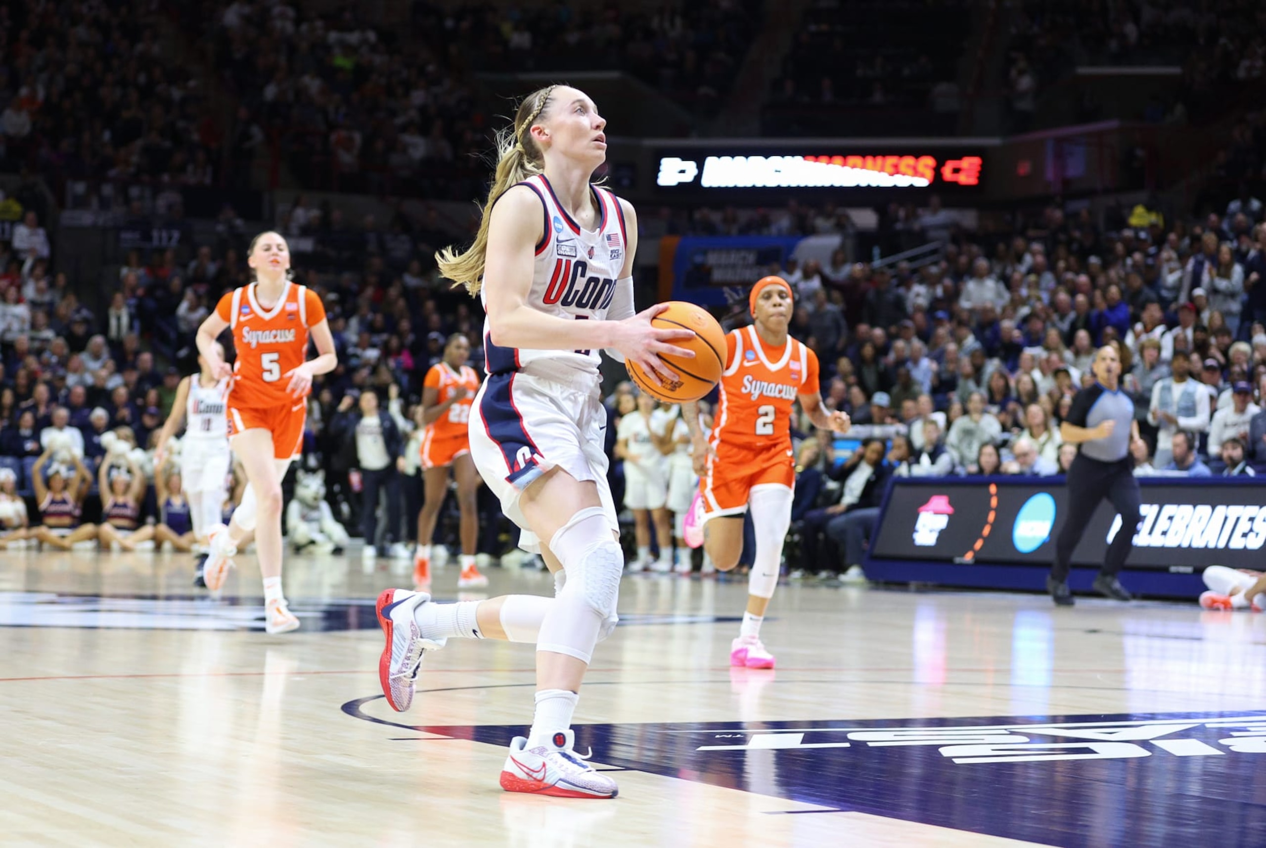 STORRS, CT - MARCH 25: UConn Huskies guard Paige Bueckers (5) drives to the basket for a lay up during the Syracuse Orange game versus the UConn Huskies in the second round of the NCAA Division I Women's Championship on March 25, 2024, at Harry A. Gampel Pavilion in Storrs, CT.  (Photo by M. Anthony Nesmith/Icon Sportswire via Getty Images)