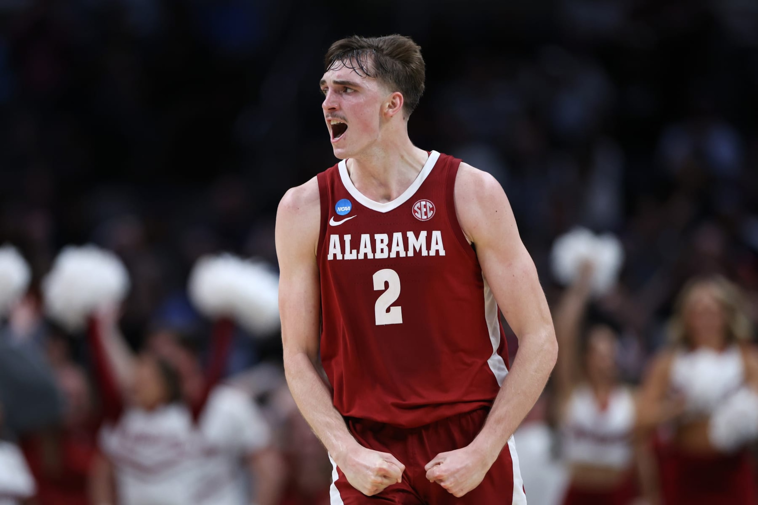 LOS ANGELES, CALIFORNIA - MARCH 28: Grant Nelson #2 of the Alabama Crimson Tide reacts after scoring against the North Carolina Tar Heels during the second half in the Sweet 16 round of the NCAA Men's Basketball Tournament at Crypto.com Arena on March 28, 2024 in Los Angeles, California. (Photo by Harry How/Getty Images)