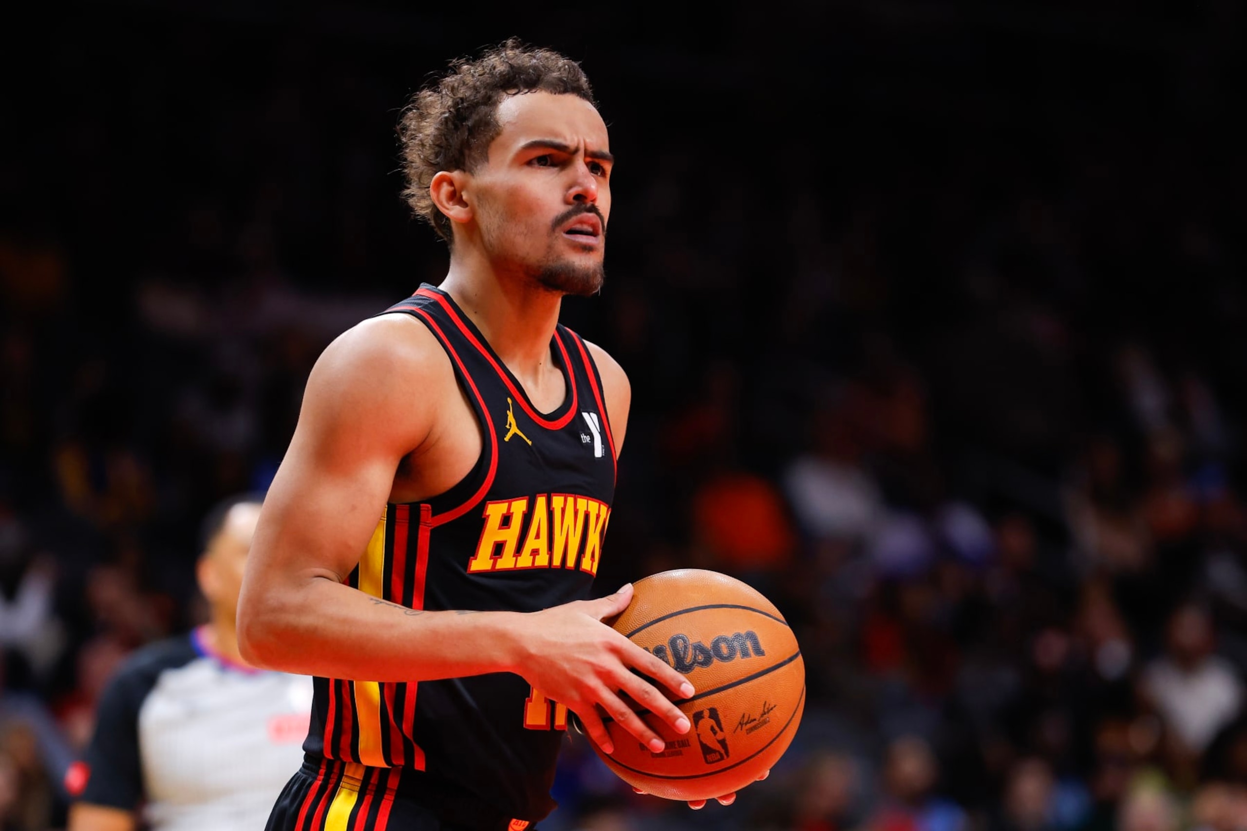 ATLANTA, GEORGIA - FEBRUARY 23: Trae Young #11 of the Atlanta Hawks reacts during the fourth quarter against the Toronto Raptors at State Farm Arena on February 23, 2024 in Atlanta, Georgia. NOTE TO USER: User expressly acknowledges and agrees that, by downloading and or using this photograph, User is consenting to the terms and conditions of the Getty Images License Agreement. (Photo by Todd Kirkland/Getty Images)