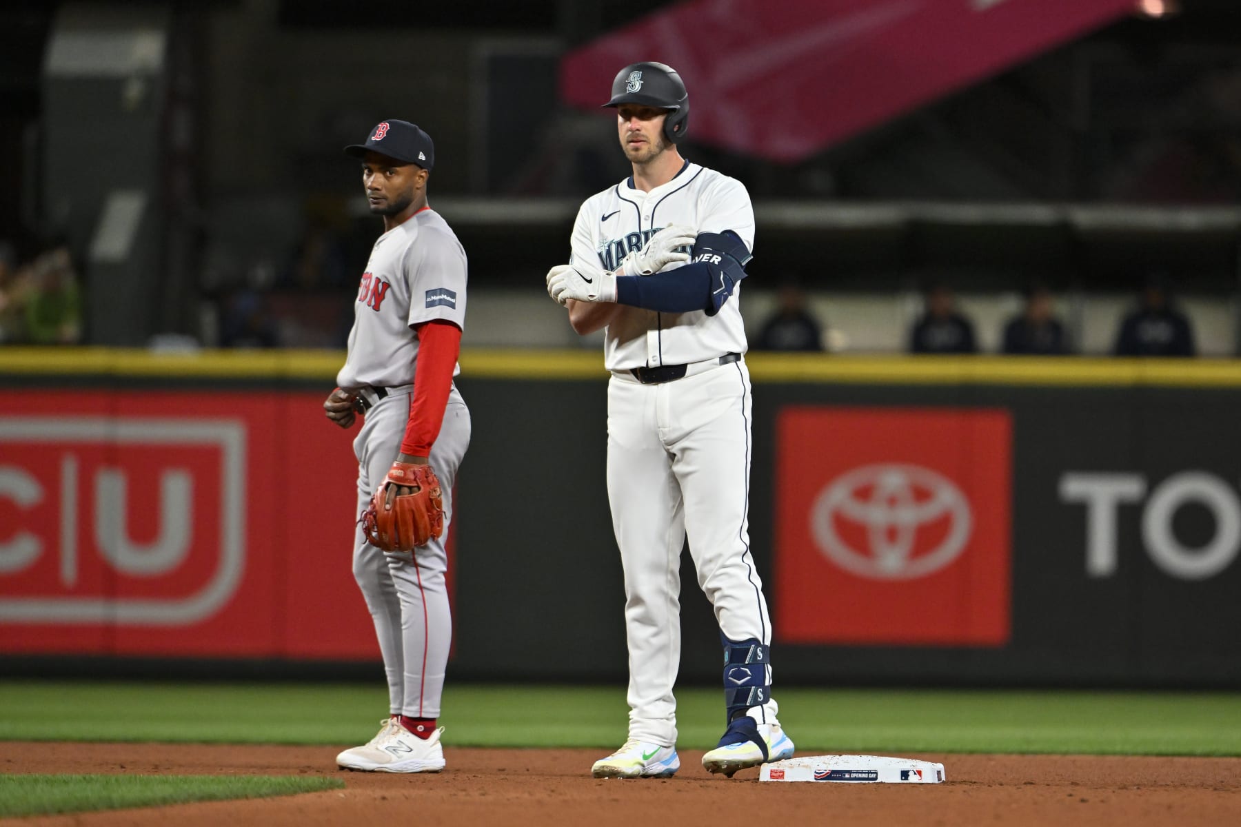 SEATTLE, WASHINGTON - MARCH 28: Mitch Garver #18 of the Seattle Mariners gestures after hitting a double during the eighth inning of the Opening Day game against the Boston Red Sox at T-Mobile Park on March 28, 2024 in Seattle, Washington. (Photo by Alika Jenner/Getty Images)