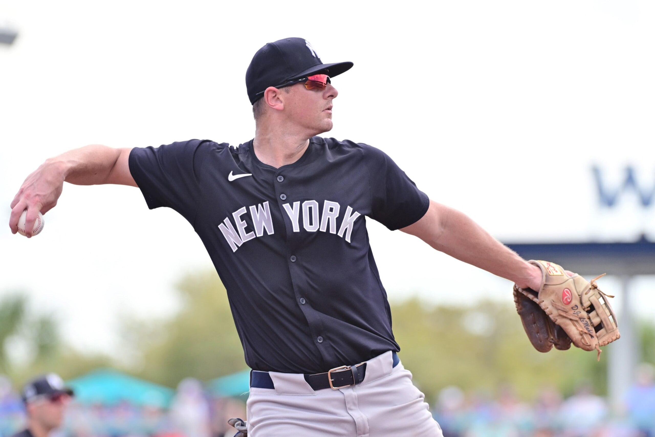 DUNEDIN, FLORIDA - MARCH 08: DJ LeMahieu #26 of the New York Yankees throws the ball to first base in the third inning against the Toronto Blue Jays during a 2024 Grapefruit League Spring Training game at TD Ballpark on March 08, 2024 in Dunedin, Florida. (Photo by Julio Aguilar/Getty Images)