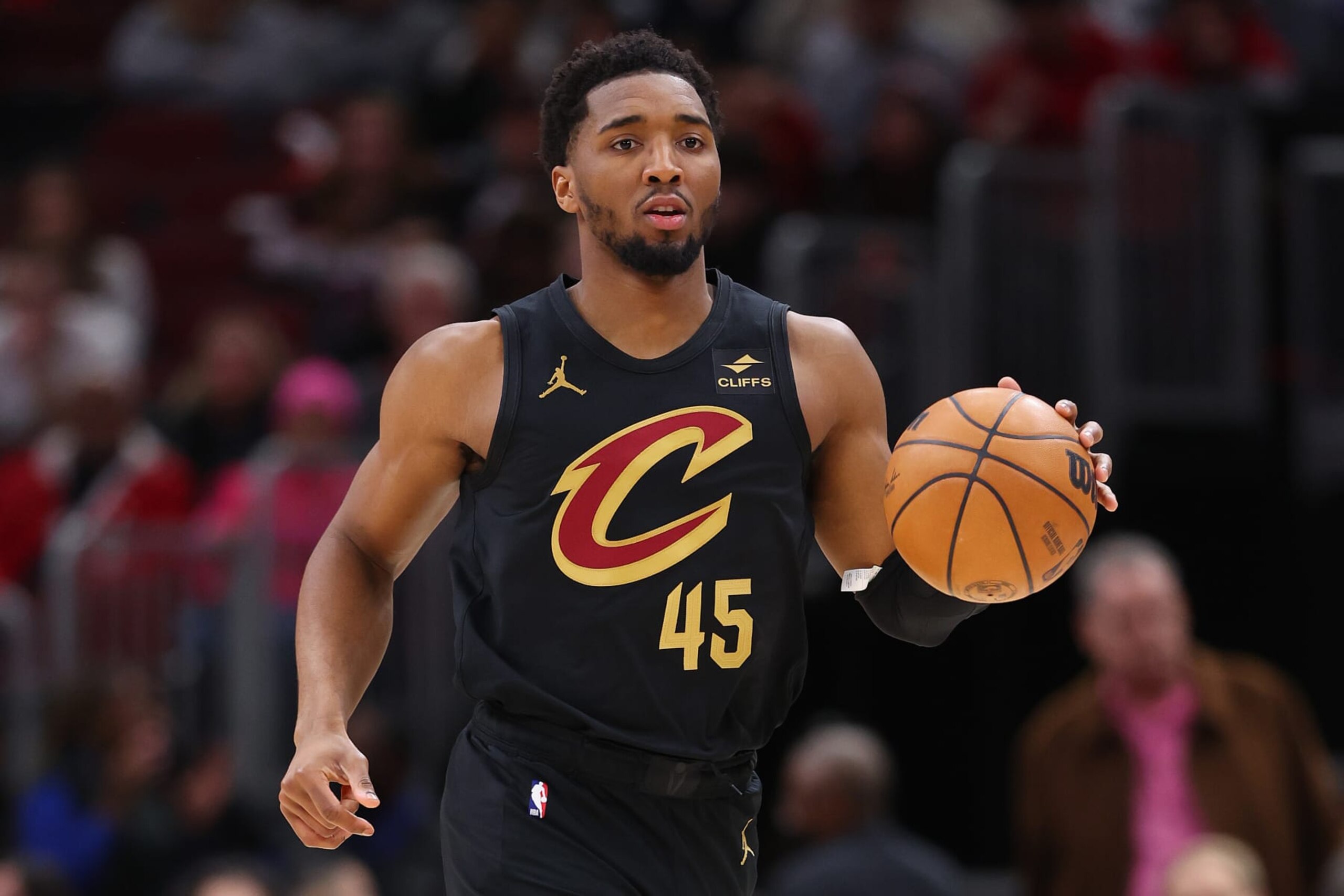 CHICAGO, ILLINOIS - FEBRUARY 28: Donovan Mitchell #45 of the Cleveland Cavaliers dribbles up the court against the Chicago Bulls during the first half at the United Center on February 28, 2024 in Chicago, Illinois. NOTE TO USER: User expressly acknowledges and agrees that, by downloading and or using this photograph, User is consenting to the terms and conditions of the Getty Images License Agreement. (Photo by Michael Reaves/Getty Images)