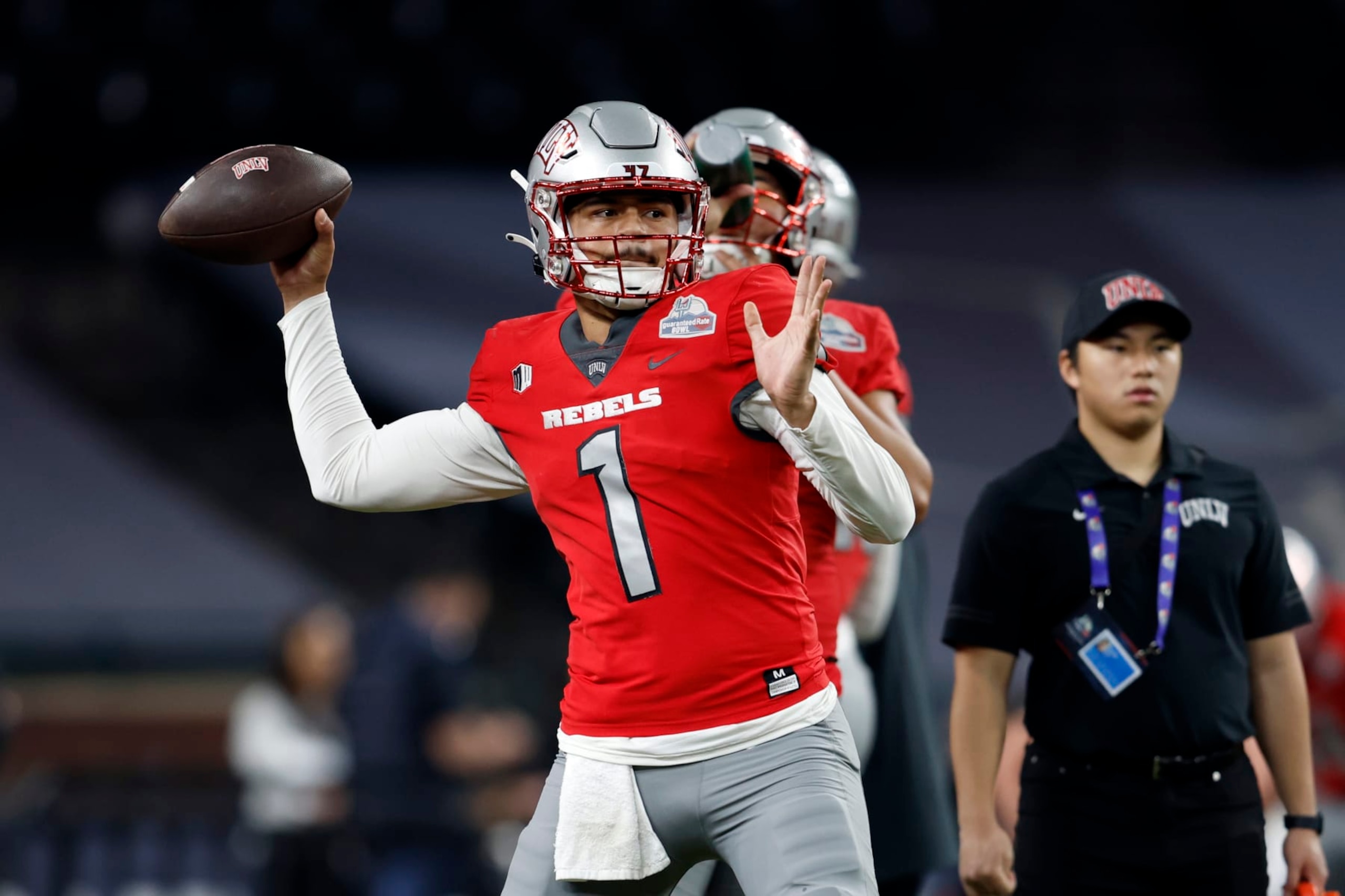 PHOENIX, ARIZONA - DECEMBER 26: Quarterback Jayden Maiava #1 of the UNLV Rebels prepares for the Guaranteed Rate Bowl game against the Kansas Jayhawks at Chase Field on December 26, 2023 in Phoenix, Arizona. (Photo by Chris Coduto/Getty Images)