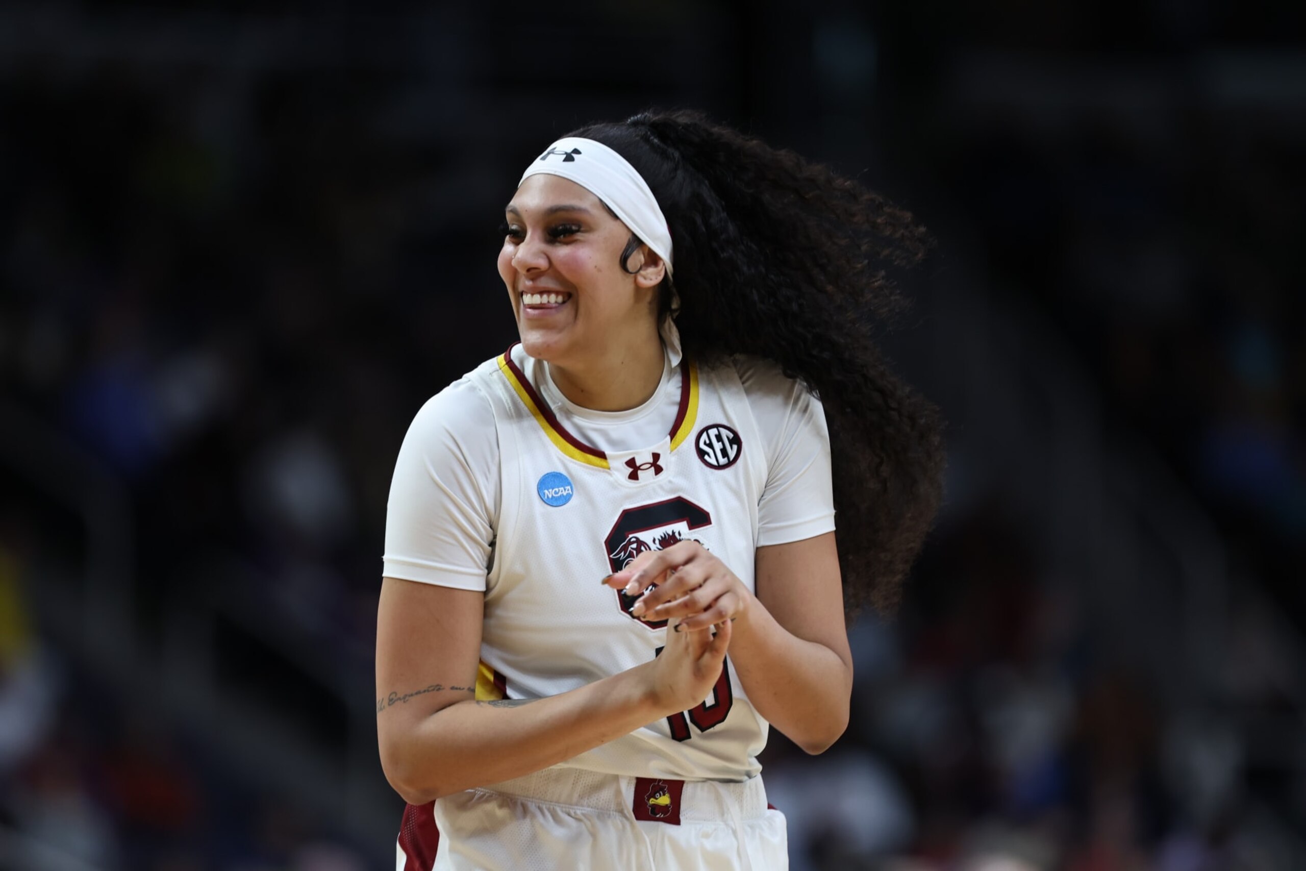 ALBANY, NEW YORK - MARCH 29: Kamilla Cardoso #10 of the South Carolina Gamecocks smiles to her teammates before the start of the second half against the Indiana Hoosiers during the Sweet Sixteen round of the 2024 NCAA Women's Basketball Tournament held at MVP Arena on March 29, 2024 in Albany, New York. (Photo by Scott Taetsch/NCAA Photos via Getty Images)
