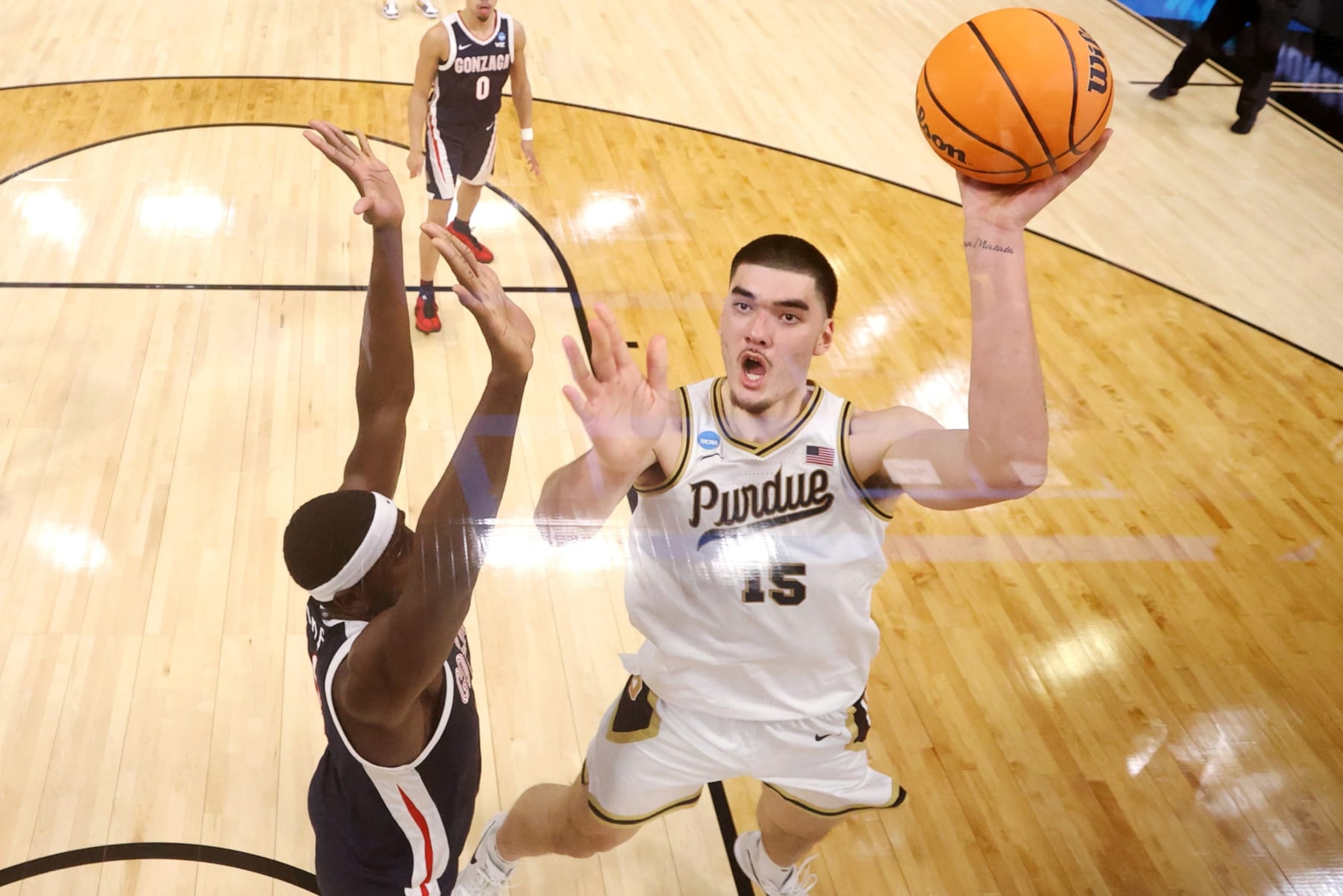 DETROIT, MICHIGAN - MARCH 29: Zach Edey #15 of the Purdue Boilermakers shoots the ball against Graham Ike #13 of the Gonzaga Bulldogs during the first half in the Sweet 16 round of the NCAA Men's Basketball Tournament at Little Caesars Arena on March 29, 2024 in Detroit, Michigan. (Photo by Gregory Shamus/Getty Images) DETROIT, MICHIGAN - MARCH 29: Zach Edey #15 of the Purdue Boilermakers shoots the ball against Graham Ike #13 of the Gonzaga Bulldogs during the first half in the Sweet 16 round of the NCAA Men's Basketball Tournament at Little Caesars Arena on March 29, 2024 in Detroit, Michigan. (Photo by Gregory Shamus/Getty Images)