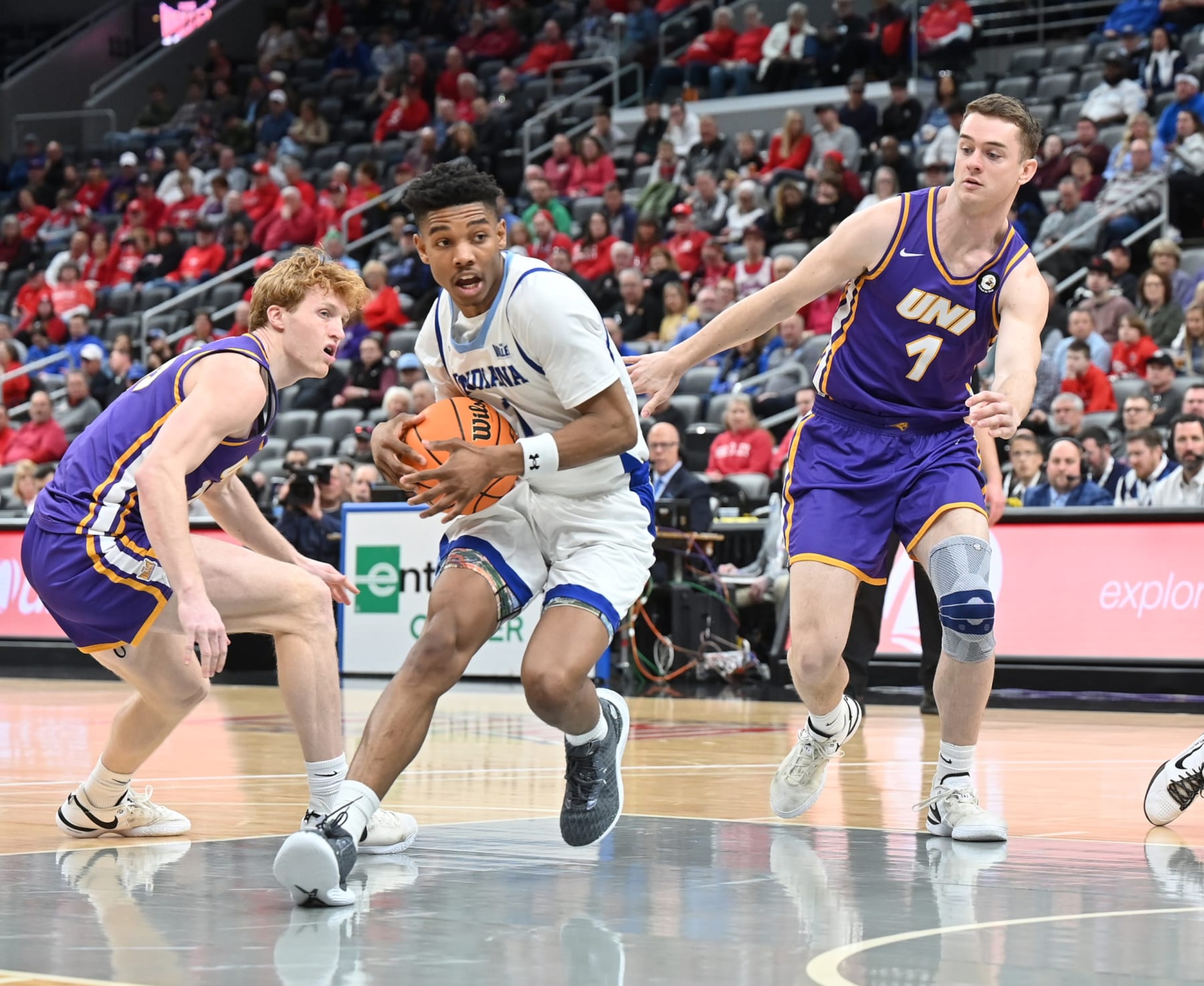ST. LOUIS, MO - MARCH 09: Indiana State guard Julian Larry (1) drives to the basket as Northern Iowa forward Cole Henry (1) defends during a Missouri Valley Conference Tournament Arch Madness semifinal game between the Indiana State Sycamores and the Northern Iowa Panthers on March 09, 2024, at Enterprise Center in St. Louis, MO. (Photo by Keith Gillett/Icon Sportswire via Getty Images)