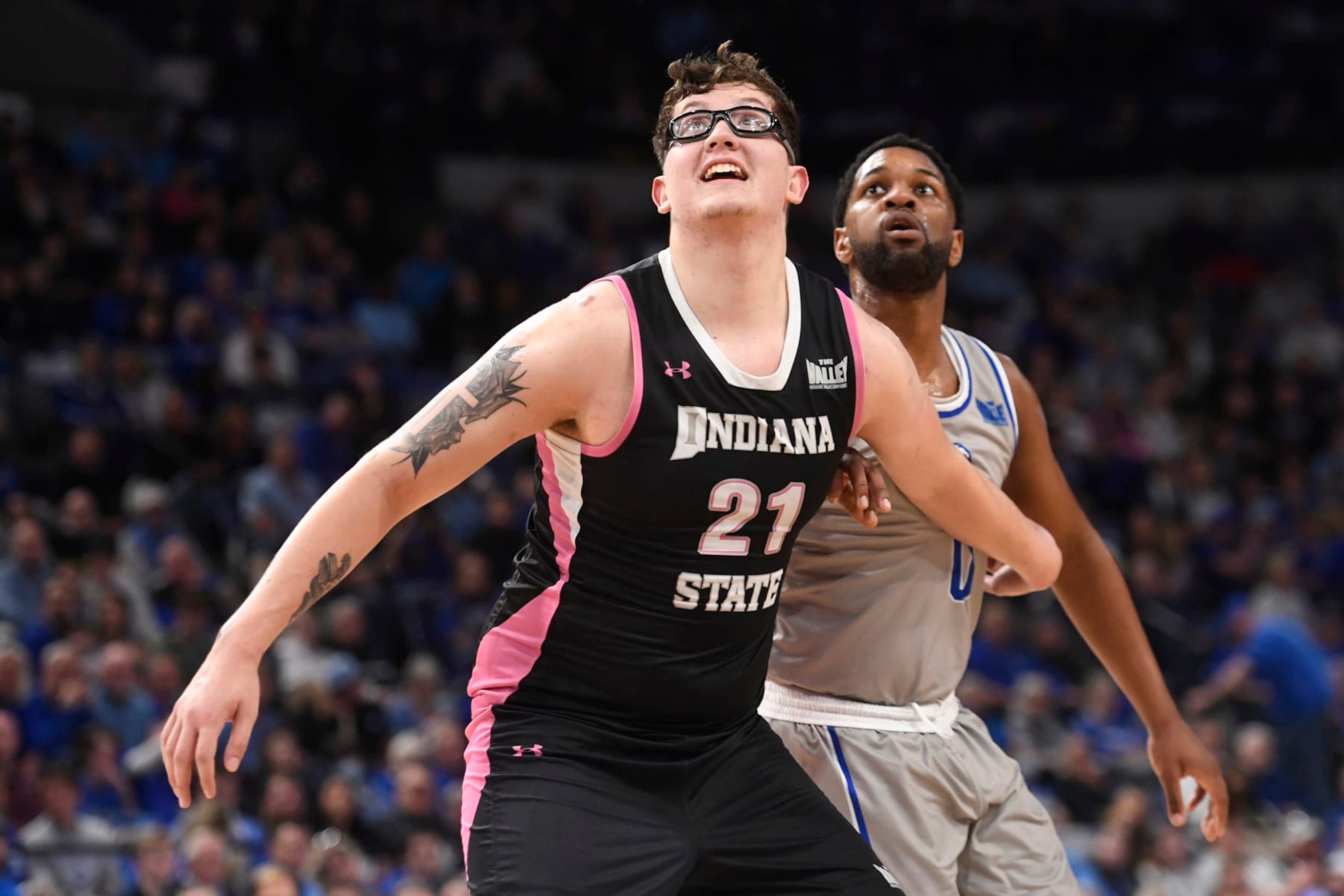 TERRE HAUTE, IN - FEBRUARY 03: Indiana State Sycamores Center Robbie Avila (21) and Drake Bulldogs Guard Kyron Gibson (0) battle for a rebound during the college basketball game between the Drake Bulldogs and the Indiana State Sycamores on February 3, 2024, at the Hulman Center in Terre Haute, Indiana. (Photo by Michael Allio/Icon Sportswire via Getty Images)