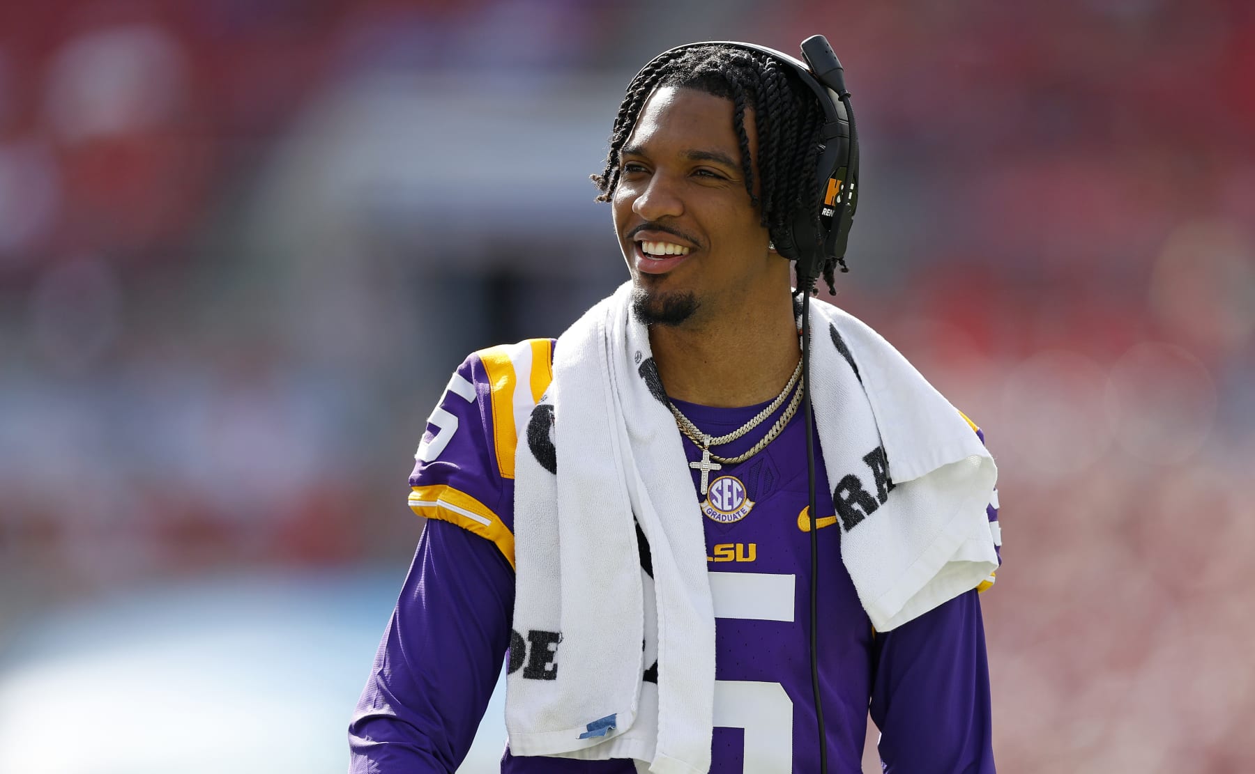 TAMPA, FLORIDA - JANUARY 01: Jayden Daniels #5 of the LSU Tigers looks on during the ReliaQuest Bowl against the Wisconsin Badgers at Raymond James Stadium on January 01, 2024 in Tampa, Florida. (Photo by Mike Ehrmann/Getty Images)
