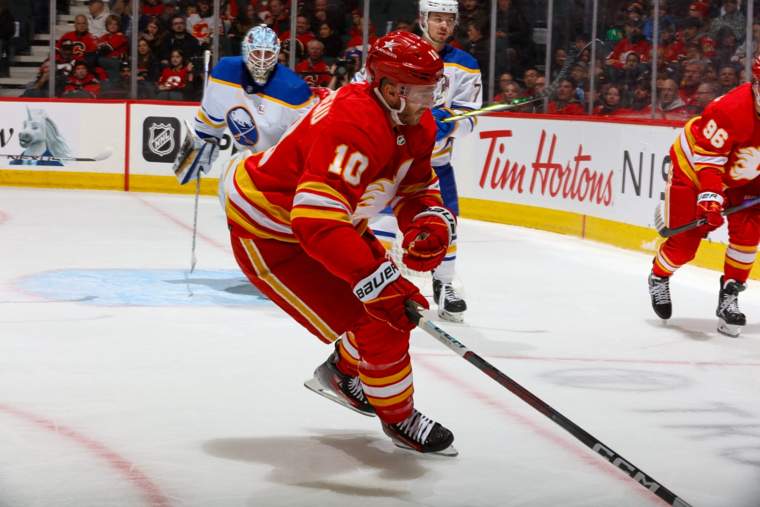 CALGARY, AB - MARCH  24: Jonathan Huberdeau #10 of the Calgary Flames skates against the Buffalo Sabres at Scotiabank Saddledome on March 24, 2024 in Calgary, Alberta, Canada. (Photo by Gerry Thomas/NHLI via Getty Images)