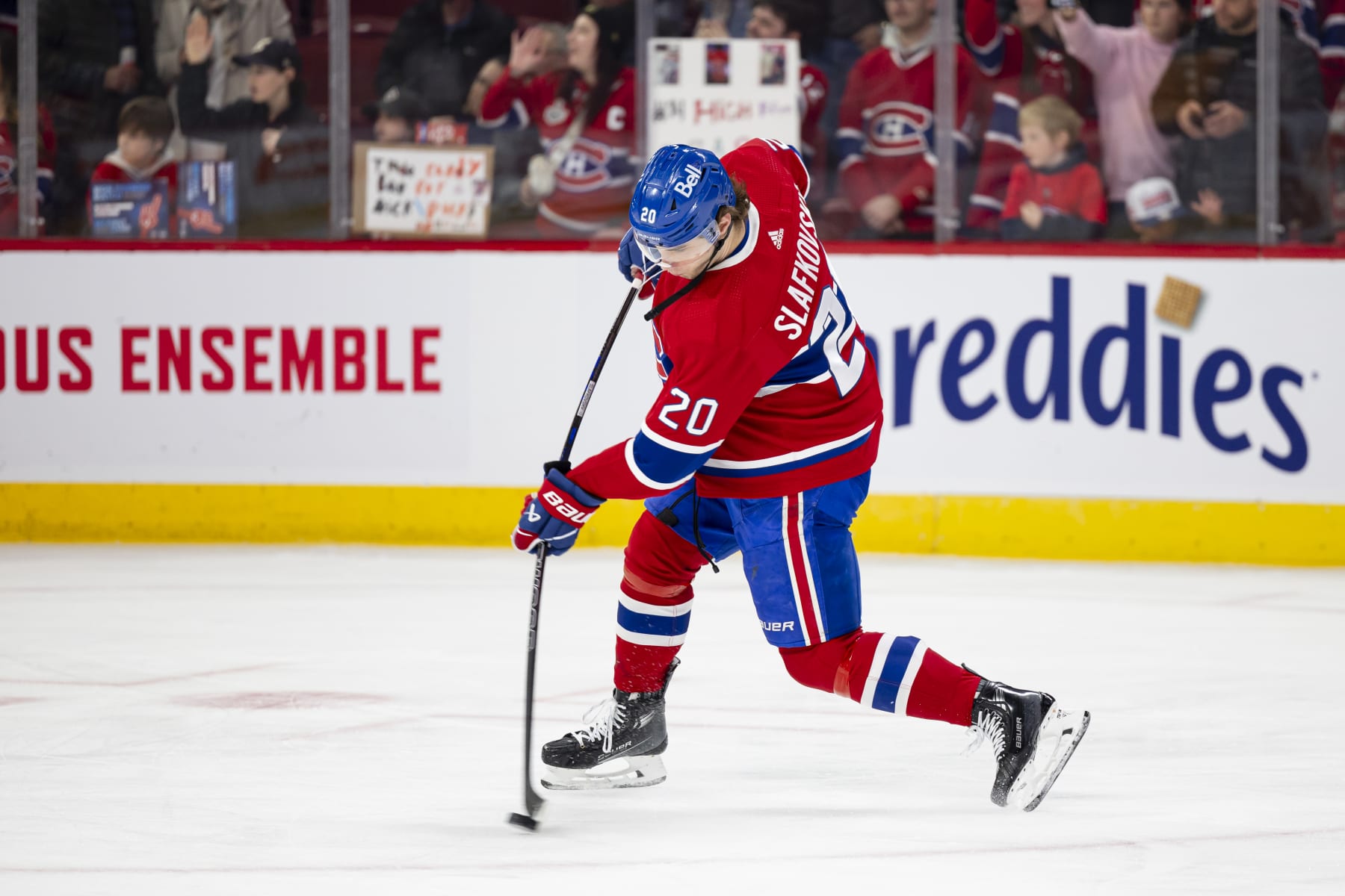 MONTREAL, CANADA - MARCH 30: Juraj Slafkovsky #20 of the Montreal Canadiens takes a shot on goal during the warm-up of the NHL regular season game between the Montreal Canadiens and the Carolina Hurricanes at the Bell Centre on March 30, 2024 in Montreal, Quebec, Canada. (Photo by Vitor Munhoz/NHLI via Getty Images)