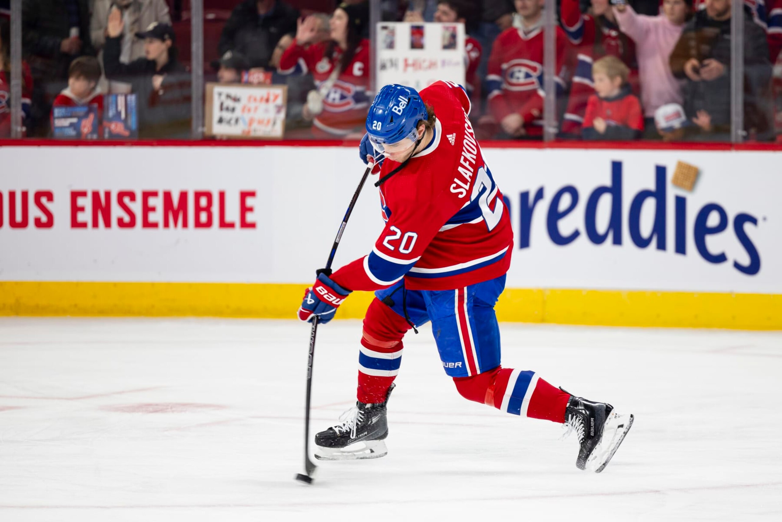 MONTREAL, CANADA - MARCH 30: Juraj Slafkovsky #20 of the Montreal Canadiens takes a shot on goal during the warm-up of the NHL regular season game between the Montreal Canadiens and the Carolina Hurricanes at the Bell Centre on March 30, 2024 in Montreal, Quebec, Canada. (Photo by Vitor Munhoz/NHLI via Getty Images)