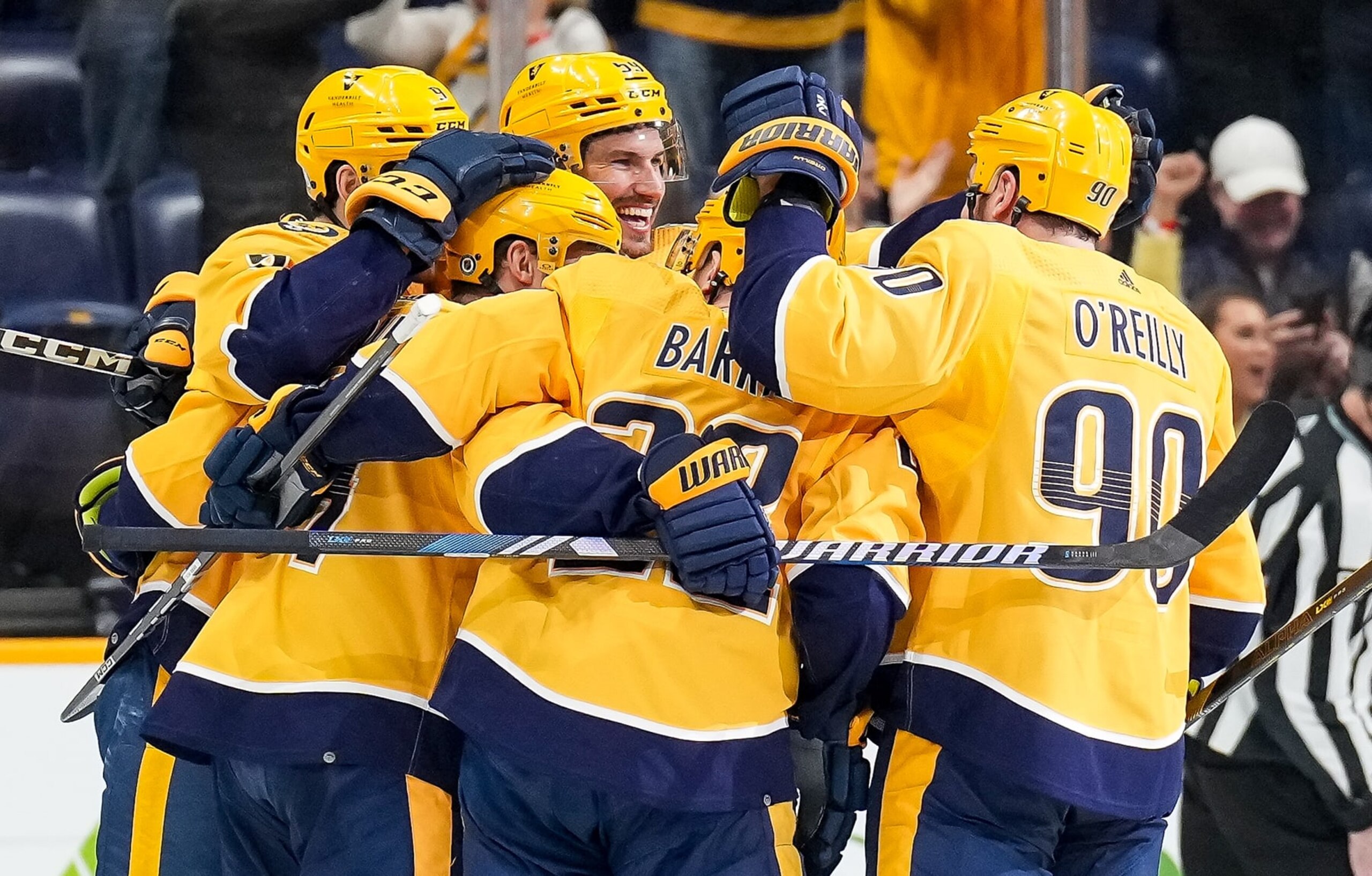 NASHVILLE, TENNESSEE - MARCH 26: Gustav Nyquist #14 celebrates his game-tying goal with Tyson Barrie #22, Ryan O'Reilly #90, and Roman Josi #59 of the Nashville Predators against the Vegas Golden Knights during an NHL game at Bridgestone Arena on March 26, 2024 in Nashville, Tennessee. (Photo by John Russell/NHLI via Getty Images)
