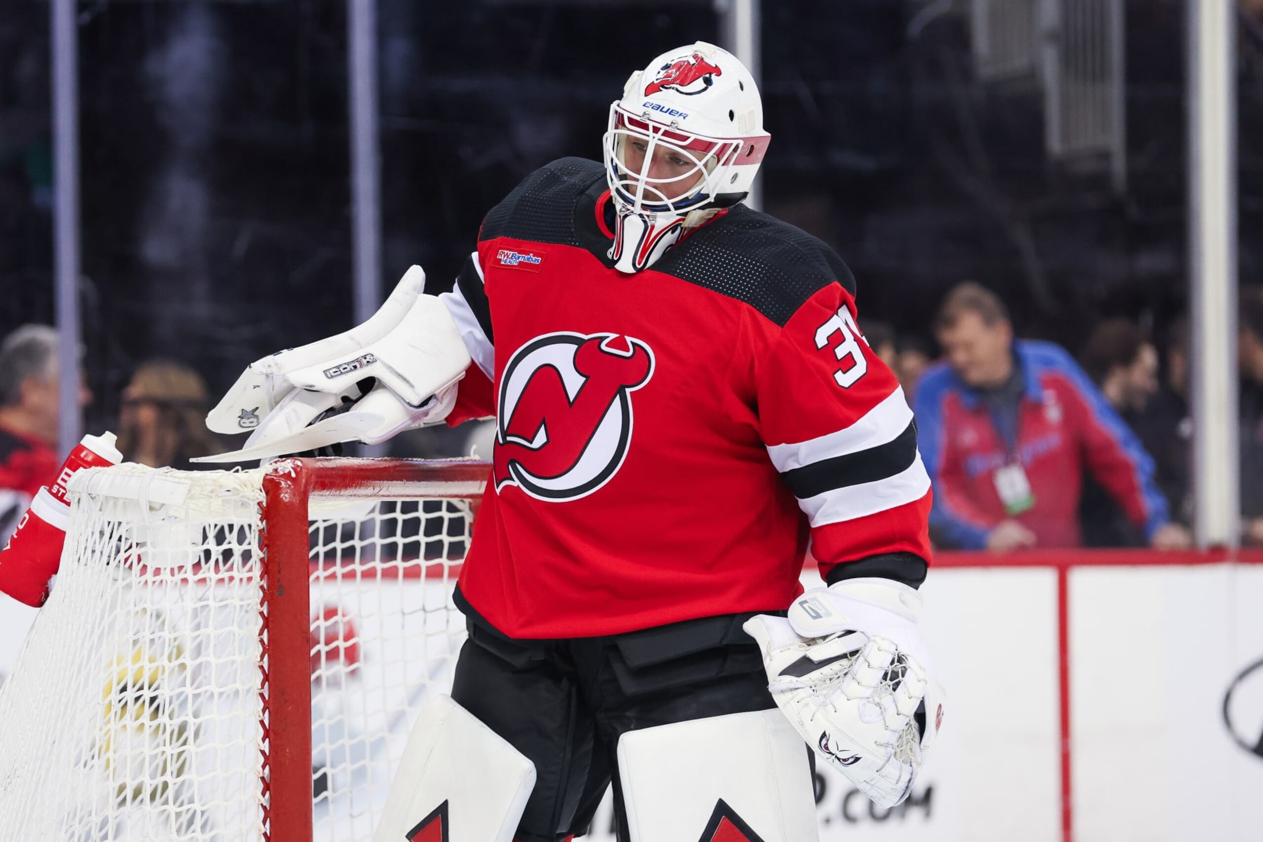 NEWARK, NJ - MARCH 21: New Jersey Devils goaltender Jake Allen (34) looks on during a game between the Winnipeg Jets and New Jersey Devils on March 21, 2024 at Prudential Center in the Newark, New Jersey. (Photo by Andrew Mordzynski/Icon Sportswire via Getty Images)