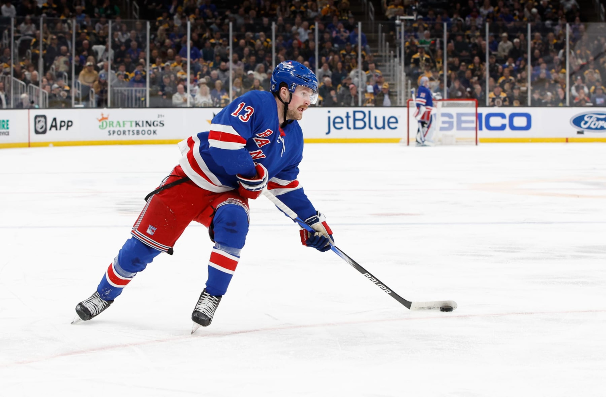 BOSTON, MASSACHUSETTS - MARCH 21: Alexis Lafreniere #13 of the New York Rangers skates against the Boston Bruins during the second period at the TD Garden on March 21, 2024 in Boston, Massachusetts. The Rangers won 5-2. (Photo by Richard T Gagnon/Getty Images)
