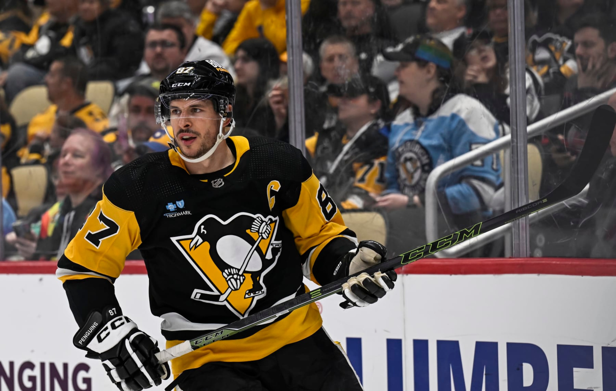 PITTSBURGH, PA - MARCH 26: Pittsburgh Penguins center Sidney Crosby (87) looks on during the second period in the NHL game between the Pittsburgh Penguins and the Carolina Hurricanes on March 26, 2024, at PPG Paints Arena in Pittsburgh, PA. (Photo by Jeanine Leech/Icon Sportswire via Getty Images)