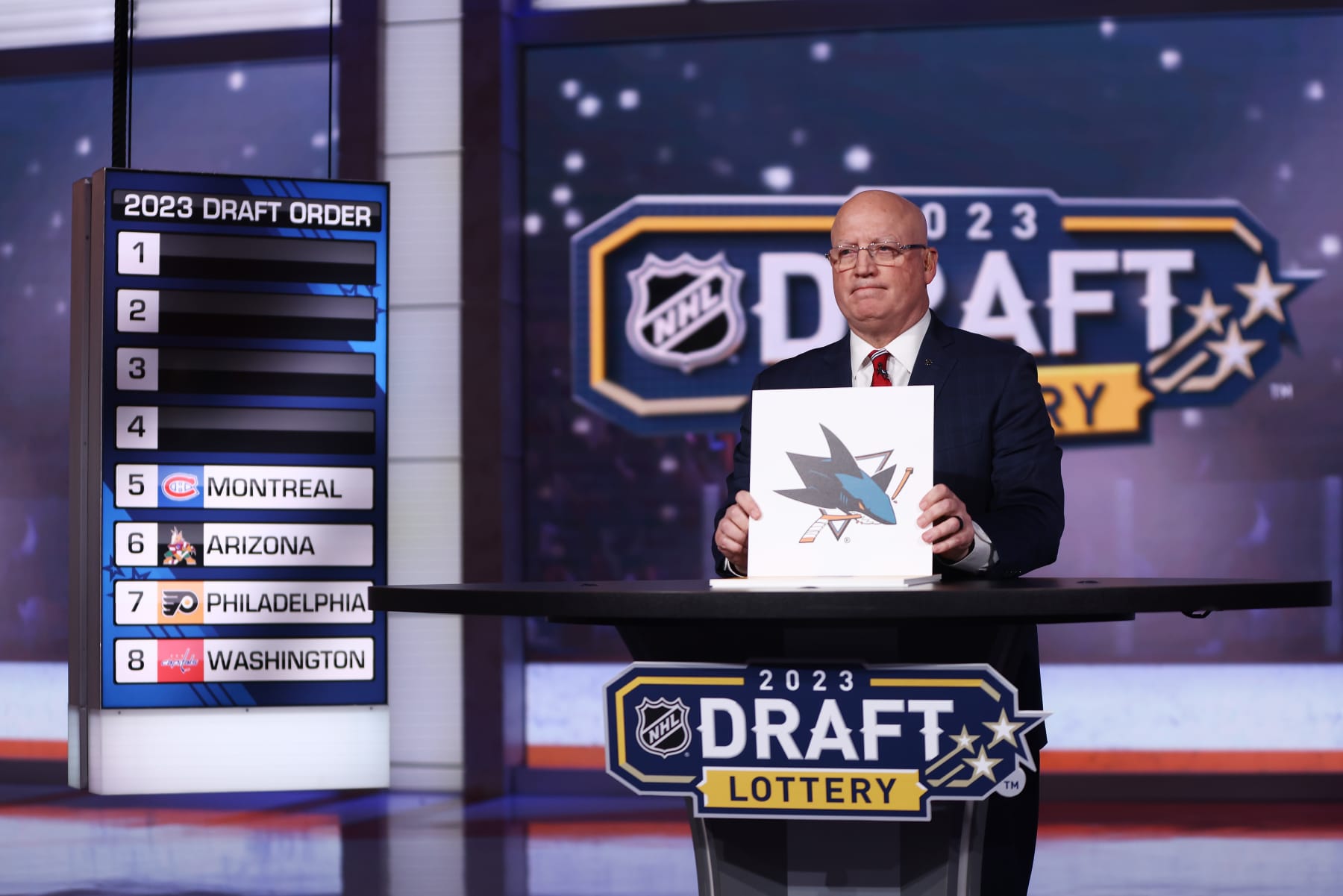 SECAUCUS, NEW JERSEY - MAY 08: National Hockey League Deputy Commissioner Bill Daly announces the San Jose Sharks #4 overall draft position during the 2023 NHL Draft Lottery on May 08, 2023 at NHL Network Studio in Secaucus, New Jersey. (Photo by Mike Stobe/NHLI via Getty Images)