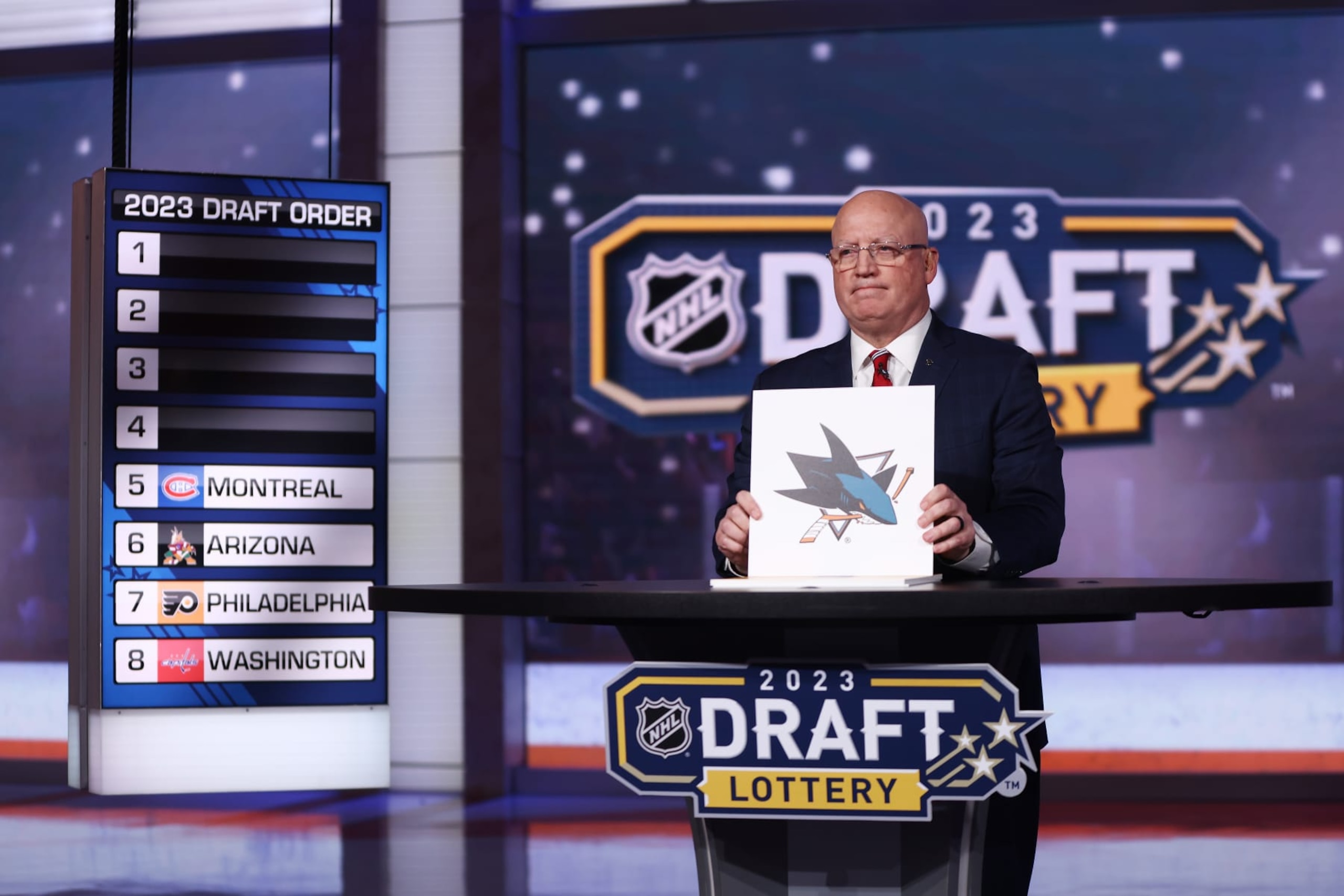 SECAUCUS, NEW JERSEY - MAY 08: National Hockey League Deputy Commissioner Bill Daly announces the San Jose Sharks #4 overall draft position during the 2023 NHL Draft Lottery on May 08, 2023 at NHL Network Studio in Secaucus, New Jersey. (Photo by Mike Stobe/NHLI via Getty Images)