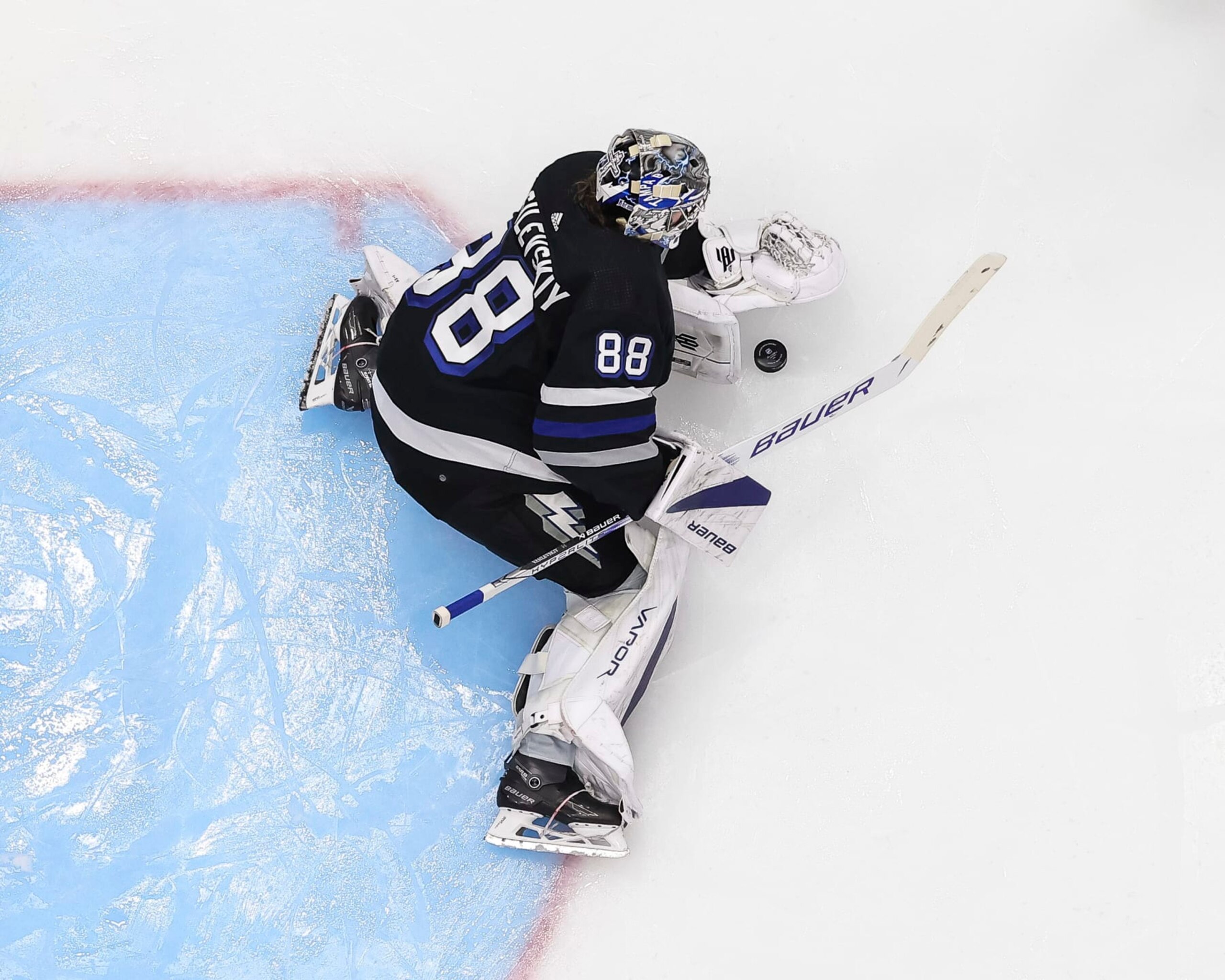 TAMPA, FL - MARCH 30: Goalie Andrei Vasilevskiy #88 of the Tampa Bay Lightning tends net against the New York Islanders during the second period at Amalie Arena on March 30, 2024 in Tampa, Florida. (Photo by Mike Carlson/NHLI via Getty Images)