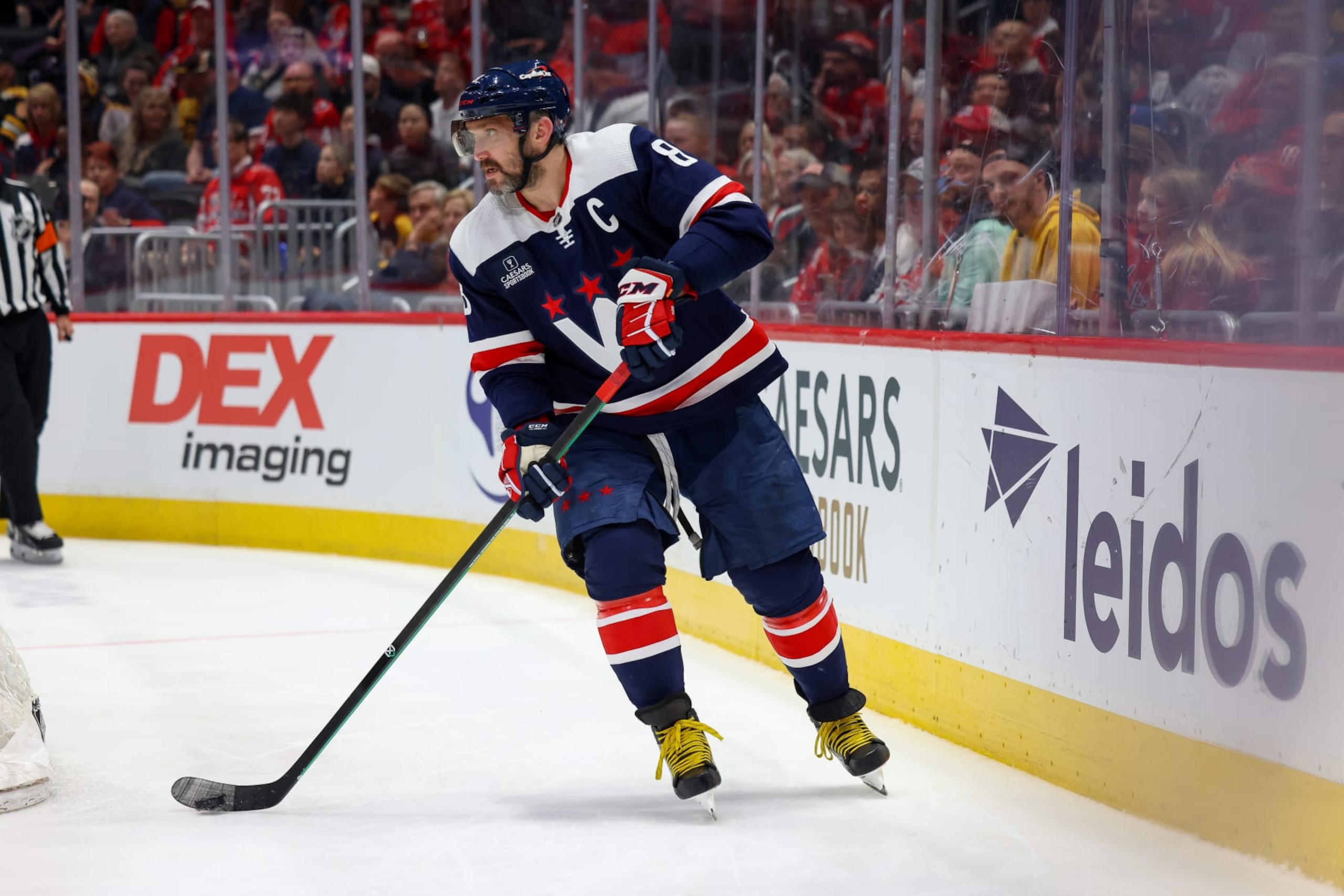 WASHINGTON, DC - MARCH 30: Alex Ovechkin #8 of the Washington Capitals controls the puck during a game against the Boston Bruins at Capital One Arena on March 30, 2024 in Washington, D.C. (Photo by John McCreary/NHLI via Getty Images)