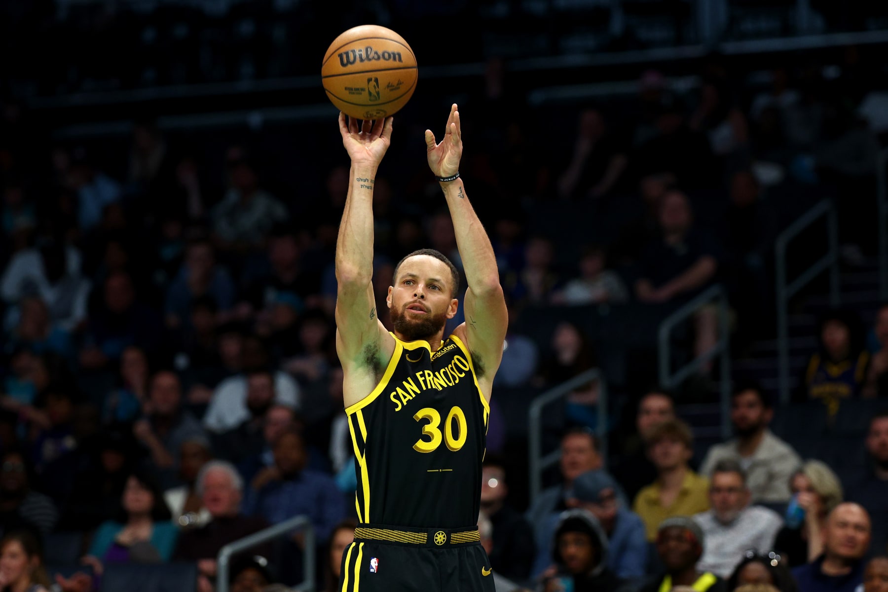 CHARLOTTE, NORTH CAROLINA - MARCH 29: Stephen Curry #30 of the Golden State Warriors attempts a three point basket during the first half of the game against the Charlotte Hornets at Spectrum Center on March 29, 2024 in Charlotte, North Carolina. NOTE TO USER: User expressly acknowledges and agrees that, by downloading and or using this photograph, User is consenting to the terms and conditions of the Getty Images License Agreement. (Photo by Jared C. Tilton/Getty Images)