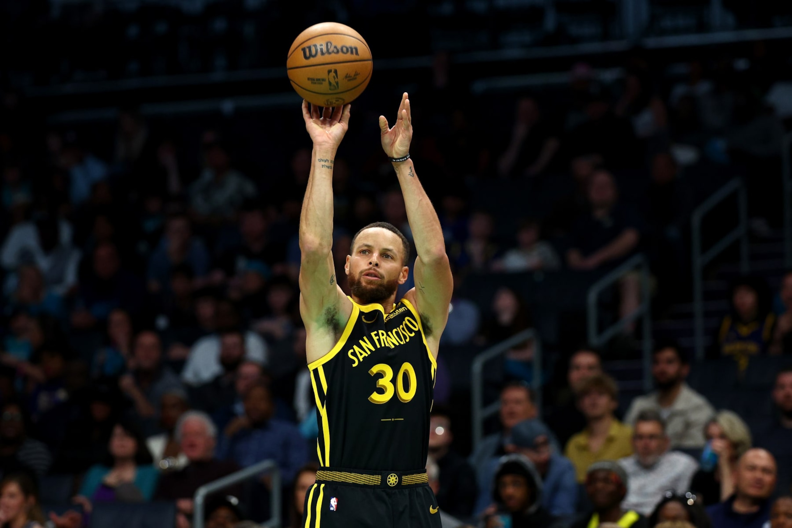 CHARLOTTE, NORTH CAROLINA - MARCH 29: Stephen Curry #30 of the Golden State Warriors attempts a three point basket during the first half of the game against the Charlotte Hornets at Spectrum Center on March 29, 2024 in Charlotte, North Carolina. NOTE TO USER: User expressly acknowledges and agrees that, by downloading and or using this photograph, User is consenting to the terms and conditions of the Getty Images License Agreement. (Photo by Jared C. Tilton/Getty Images)