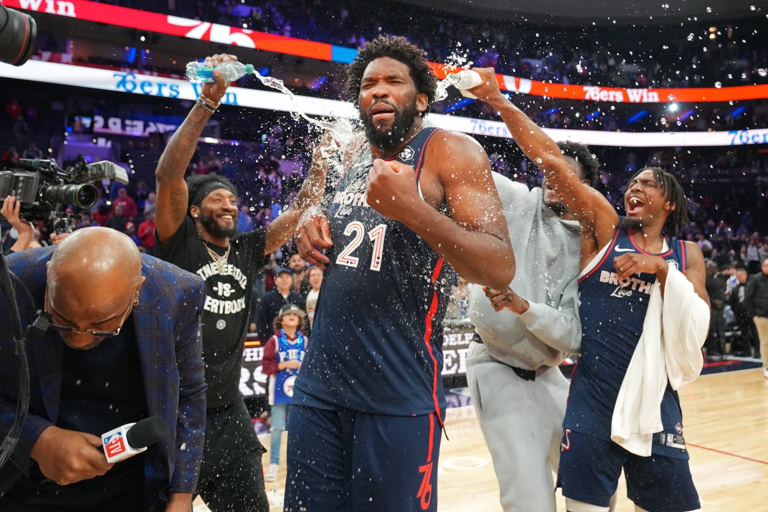 PHILADELPHIA, PA - JANUARY 22: Joel Embiid #21 of the Philadelphia 76ers celebrates with teammates after setting a new franchise record of 70 points during the game against the San Antonio Spurs  on January 22, 2024 at the Wells Fargo Center in Philadelphia, Pennsylvania NOTE TO USER: User expressly acknowledges and agrees that, by downloading and/or using this Photograph, user is consenting to the terms and conditions of the Getty Images License Agreement. Mandatory Copyright Notice: Copyright 2024 NBAE (Photo by Jesse D. Garrabrant/NBAE via Getty Images)