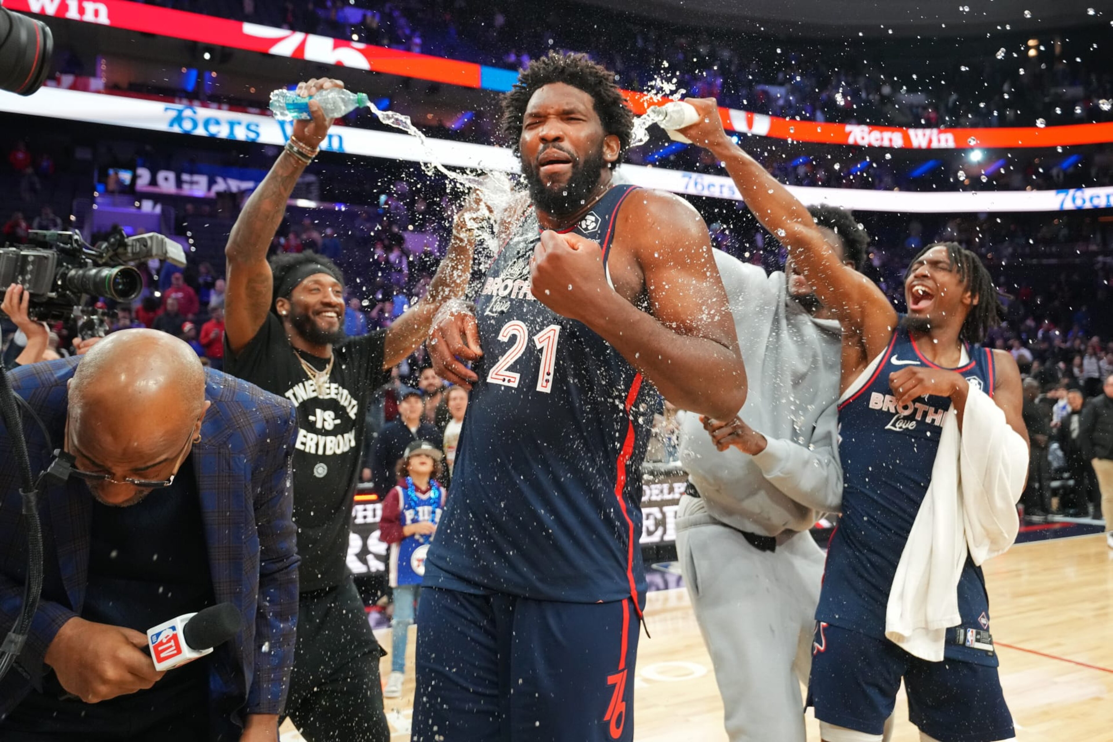 PHILADELPHIA, PA - JANUARY 22: Joel Embiid #21 of the Philadelphia 76ers celebrates with teammates after setting a new franchise record of 70 points during the game against the San Antonio Spurs on January 22, 2024 at the Wells Fargo Center in Philadelphia, Pennsylvania NOTE TO USER: User expressly acknowledges and agrees that, by downloading and/or using this Photograph, user is consenting to the terms and conditions of the Getty Images License Agreement. Mandatory Copyright Notice: Copyright 2024 NBAE (Photo by Jesse D. Garrabrant/NBAE via Getty Images) PHILADELPHIA, PA - JANUARY 22: Joel Embiid #21 of the Philadelphia 76ers celebrates with teammates after setting a new franchise record of 70 points during the game against the San Antonio Spurs on January 22, 2024 at the Wells Fargo Center in Philadelphia, Pennsylvania NOTE TO USER: User expressly acknowledges and agrees that, by downloading and/or using this Photograph, user is consenting to the terms and conditions of the Getty Images License Agreement. Mandatory Copyright Notice: Copyright 2024 NBAE (Photo by Jesse D. Garrabrant/NBAE via Getty Images)