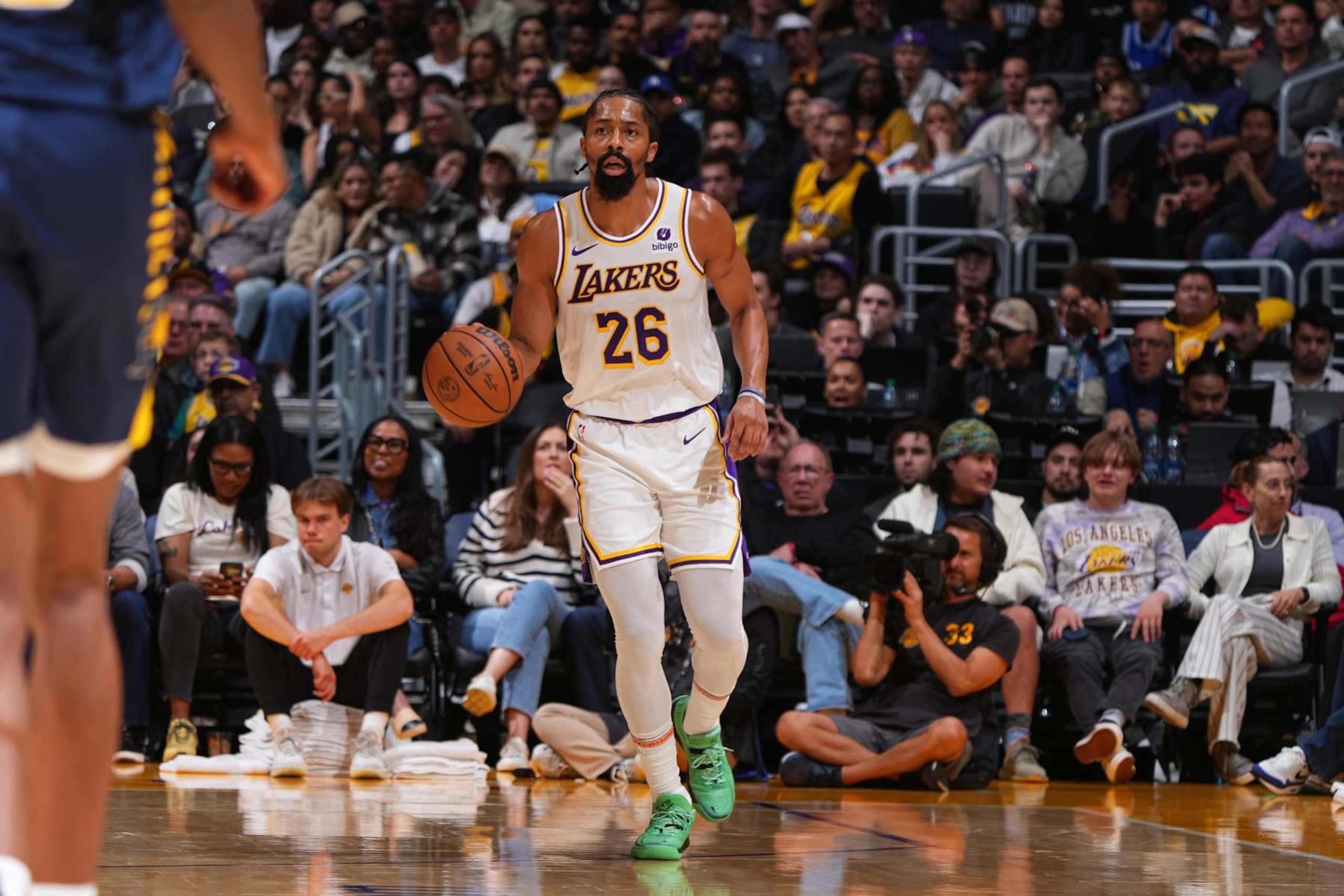 LOS ANGELES, CA - MARCH 24: Spencer Dinwiddie #26 of the Los Angeles Lakers handles the ball during the game against the Indiana Pacers on March 24, 2024 at Crypto.Com Arena in Los Angeles, California. NOTE TO USER: User expressly acknowledges and agrees that, by downloading and/or using this Photograph, user is consenting to the terms and conditions of the Getty Images License Agreement. Mandatory Copyright Notice: Copyright 2024 NBAE (Photo by Garrett Ellwood/NBAE via Getty Images)