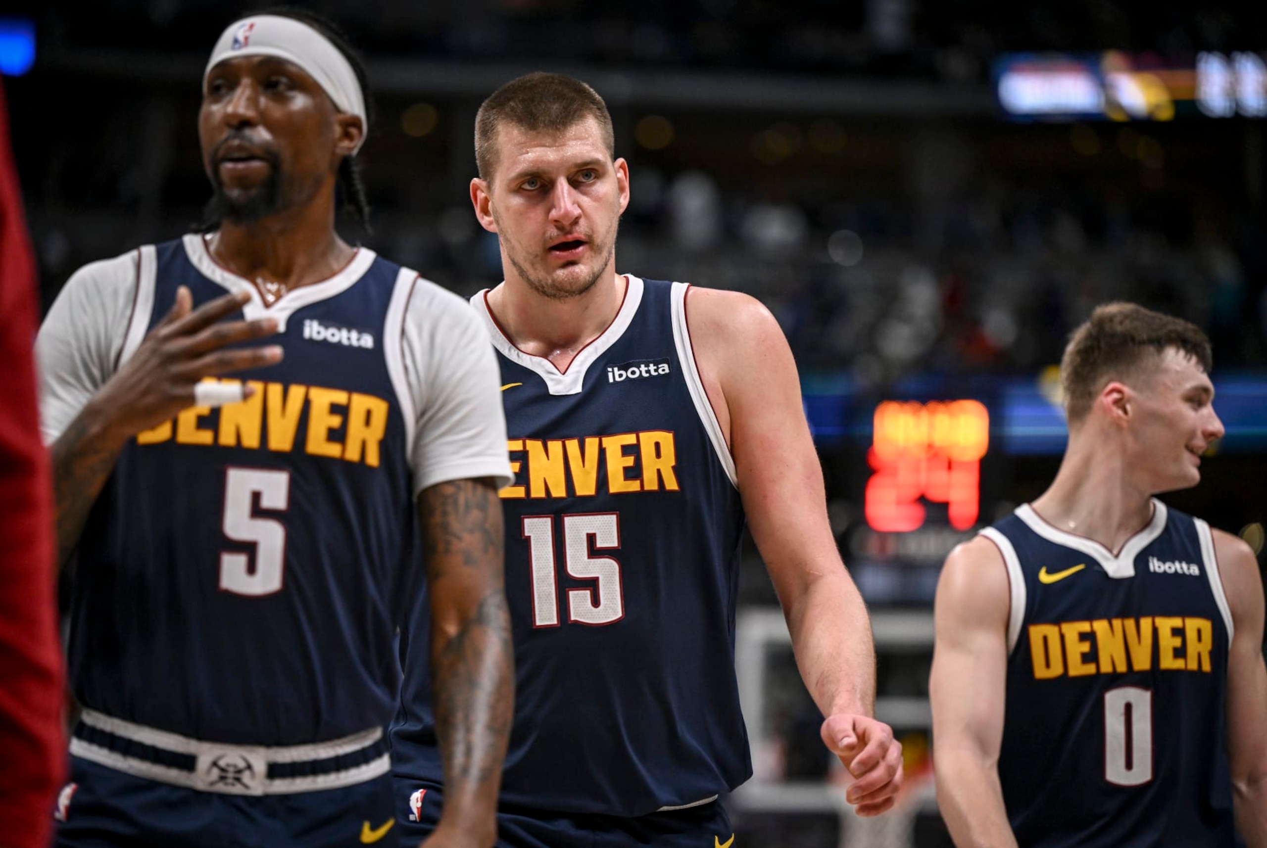 DENVER, CO - MARCH 31: Kentavious Caldwell-Pope (5), Nikola Jokic (15) and Christian Braun (0) of the Denver Nuggets walk off the court after the second quarter against the Cleveland Cavaliers at Ball Arena in Denver on Sunday, March 31, 2024. (Photo by AAron Ontiveroz/The Denver Post) DENVER, CO - MARCH 31: Kentavious Caldwell-Pope (5), Nikola Jokic (15) and Christian Braun (0) of the Denver Nuggets walk off the court after the second quarter against the Cleveland Cavaliers at Ball Arena in Denver on Sunday, March 31, 2024. (Photo by AAron Ontiveroz/The Denver Post)