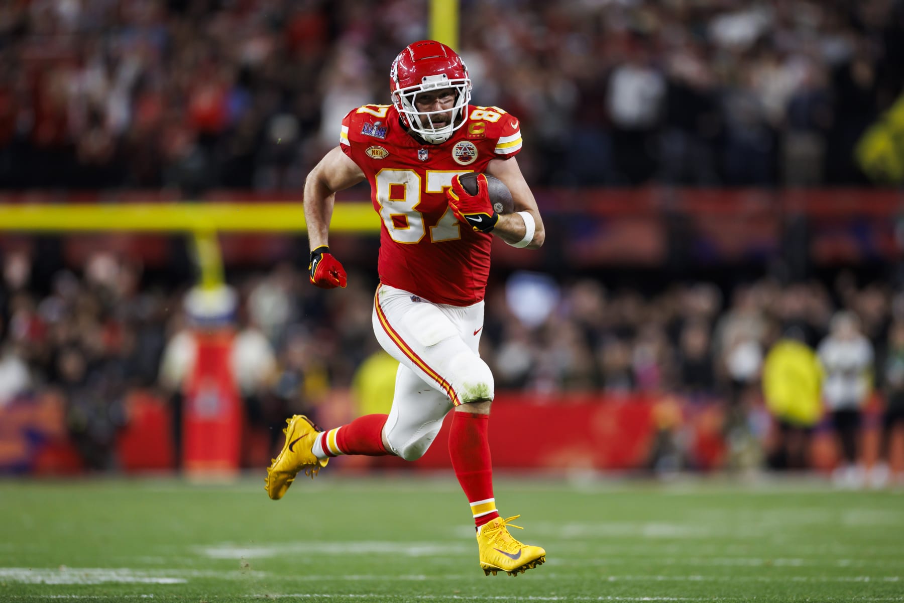 LAS VEGAS, NEVADA - FEBRUARY 11: Travis Kelce #87 of the Kansas City Chiefs runs the ball after a catch during Super Bowl LVIII against the San Francisco 49ers at Allegiant Stadium on February 11, 2024 in Las Vegas, Nevada. (Photo by Ryan Kang/Getty Images)