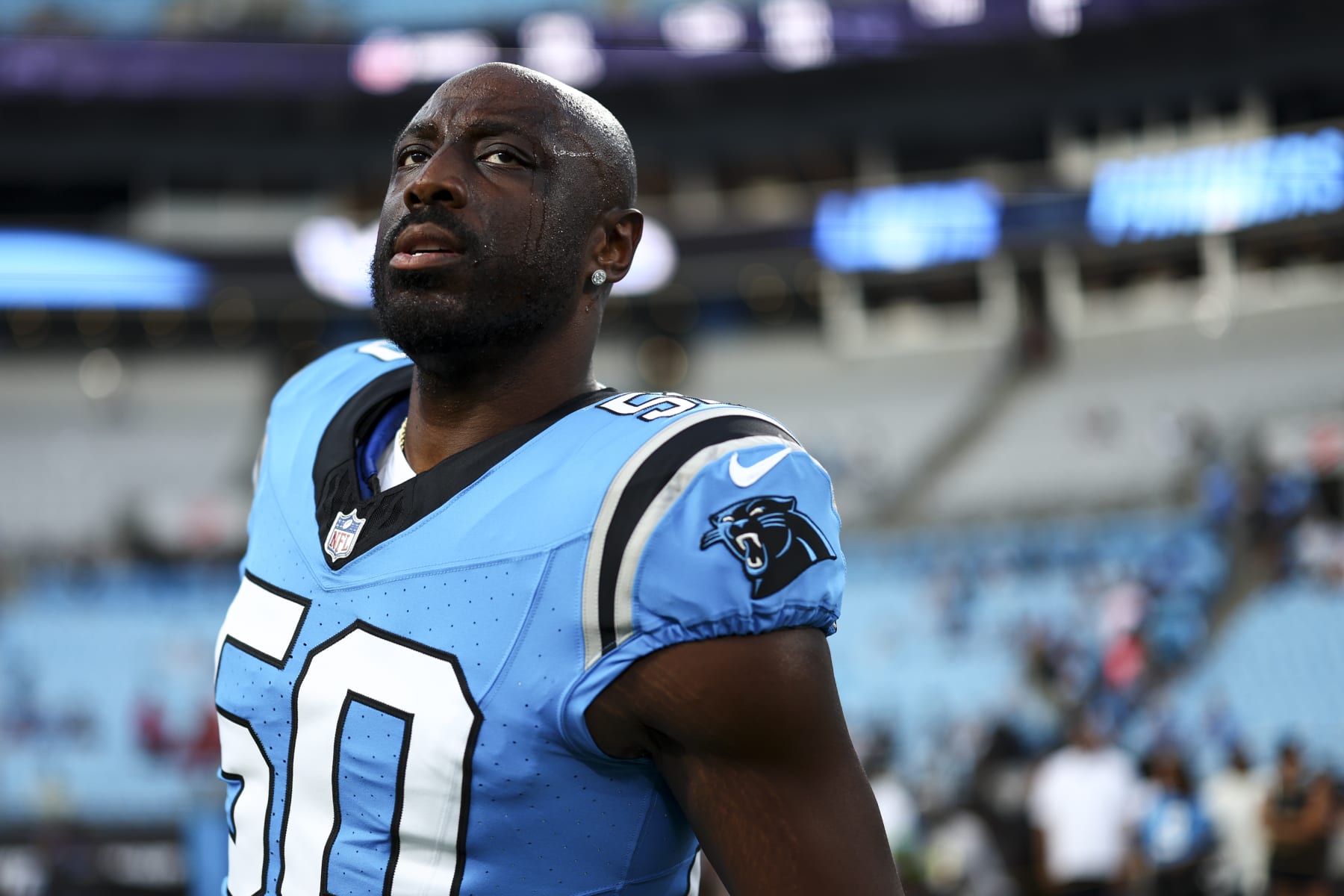 CHARLOTTE, NC - AUGUST 25: Justin Houston #50 of the Carolina Panthers stretches prior to an NFL preseason football game against the Detroit Lions at Bank of America Stadium on August 25, 2023 in Charlotte, North Carolina. (Photo by Kevin Sabitus/Getty Images)