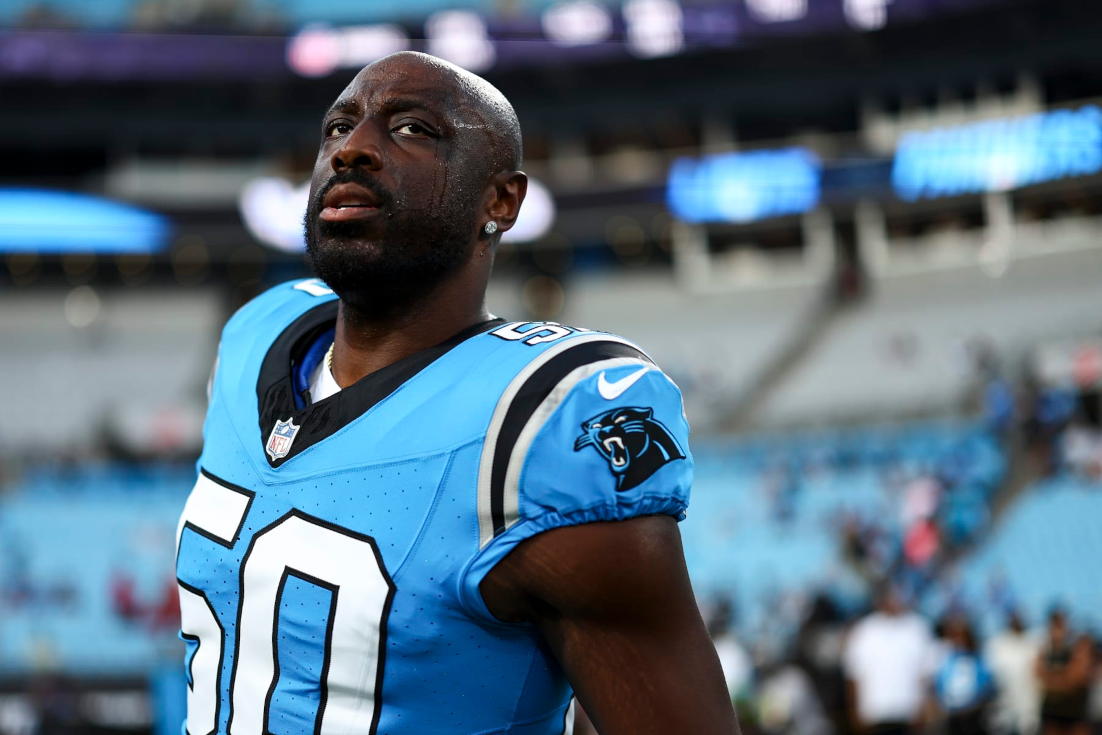CHARLOTTE, NC - AUGUST 25: Justin Houston #50 of the Carolina Panthers stretches prior to an NFL preseason football game against the Detroit Lions at Bank of America Stadium on August 25, 2023 in Charlotte, North Carolina. (Photo by Kevin Sabitus/Getty Images)