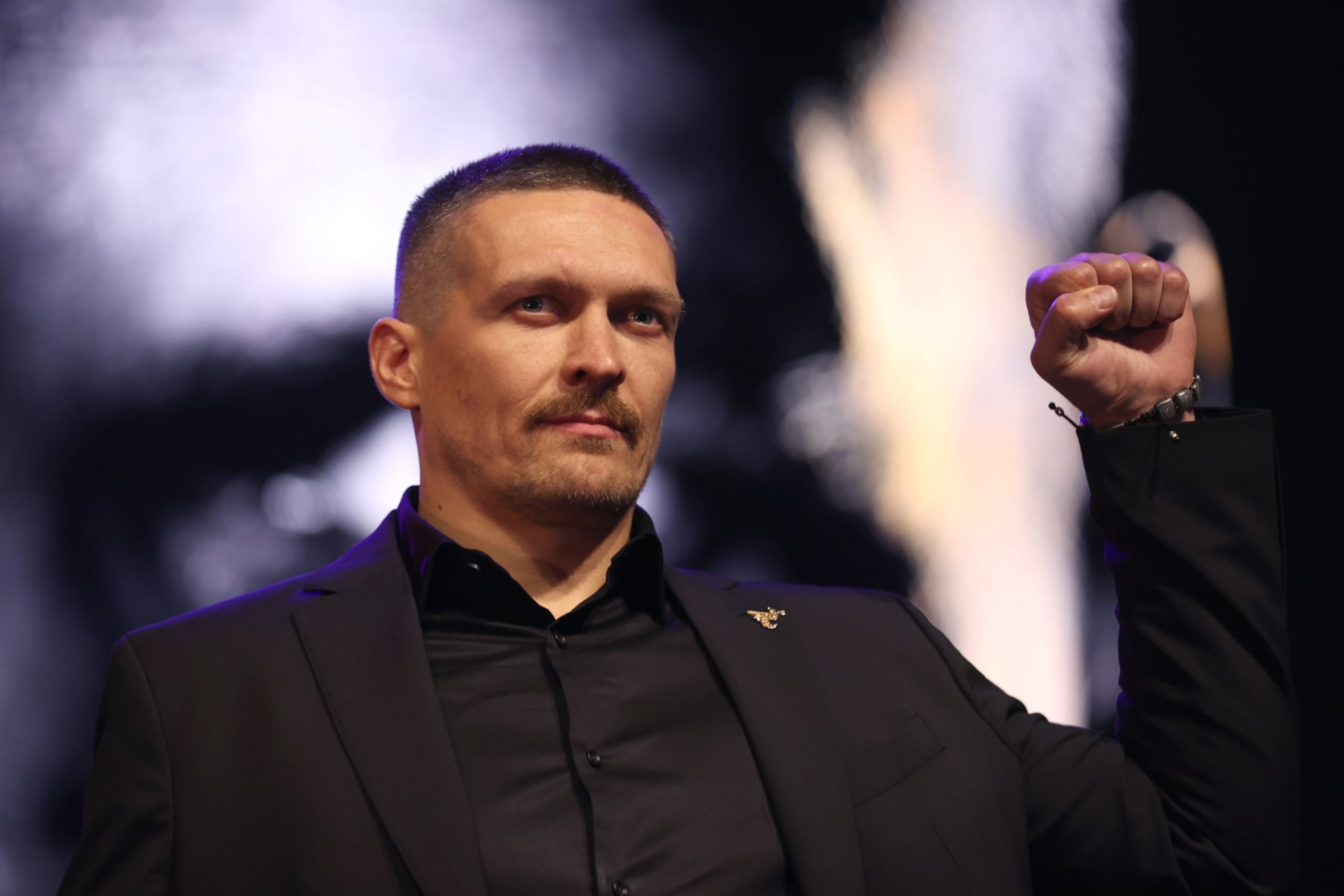 LONDON, ENGLAND - NOVEMBER 16: Oleksandr Usyk reacts during the Tyson Fury v Oleksandr Usyk Press Conference at Outernet London on November 16, 2023 in London, England. (Photo by Alex Pantling/Getty Images)