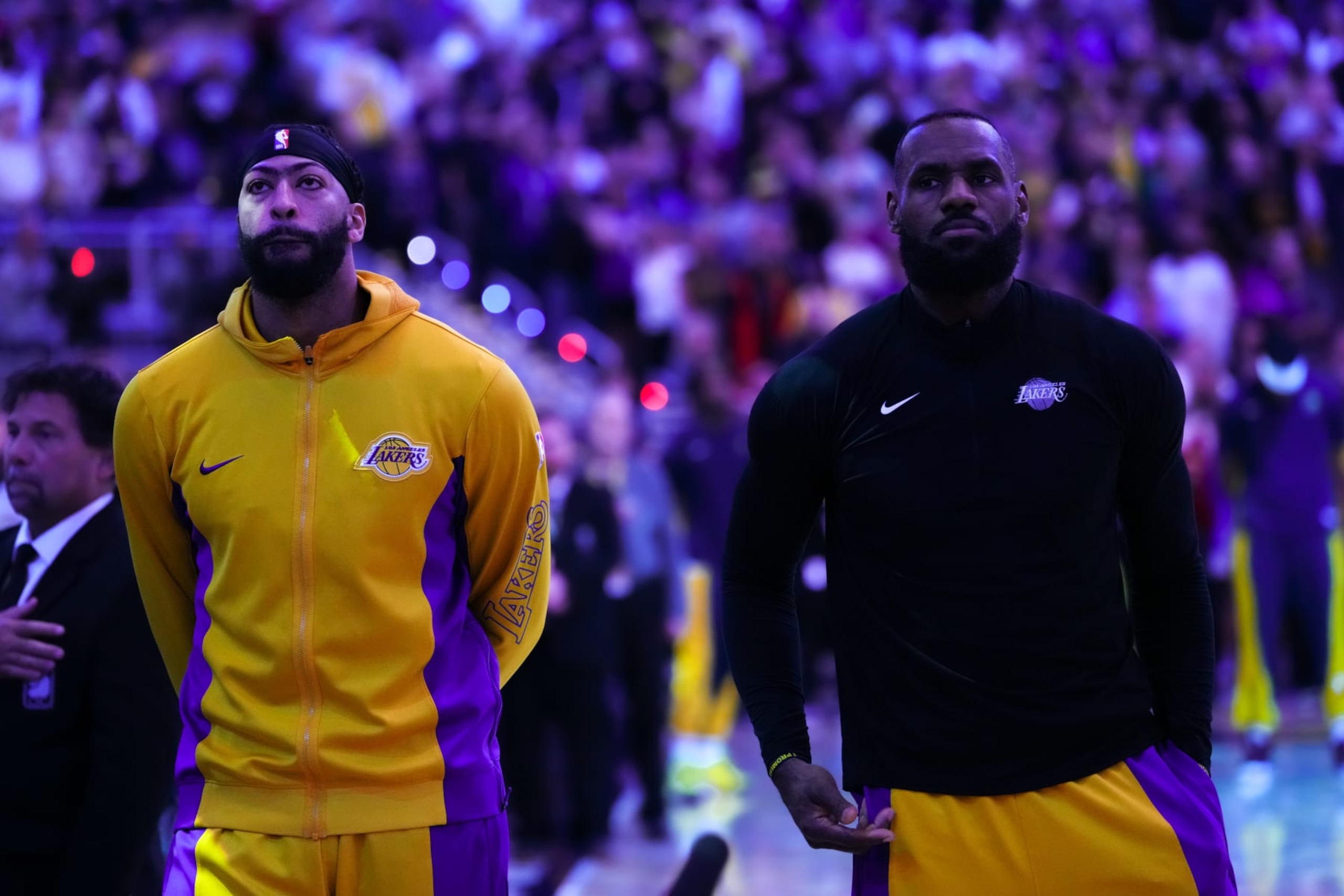 INDIANAPOLIS, INDIANA - MARCH 29: Anthony Davis #3 and LeBron James #23 of the Los Angeles Lakers stand for the singing of the national anthem before the game against the Indiana Pacers at Gainbridge Fieldhouse on March 29, 2024 in Indianapolis, Indiana. NOTE TO USER: User expressly acknowledges and agrees that, by downloading and or using this photograph, User is consenting to the terms and conditions of the Getty Images License Agreement. (Photo by Dylan Buell/Getty Images)