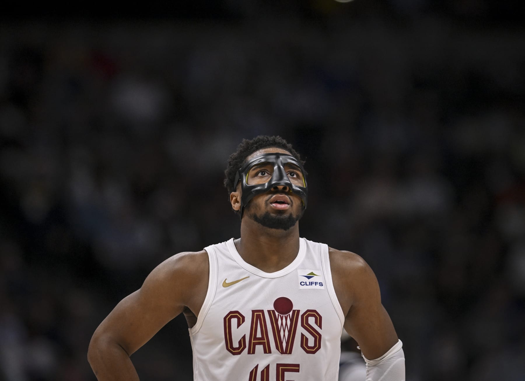 DENVER, CO - MARCH 31: Donovan Mitchell (45) of the Cleveland Cavaliers sports a mask during the second quarter against the Denver Nuggets at Ball Arena in Denver on Sunday, March 31, 2024. (Photo by AAron Ontiveroz/The Denver Post)