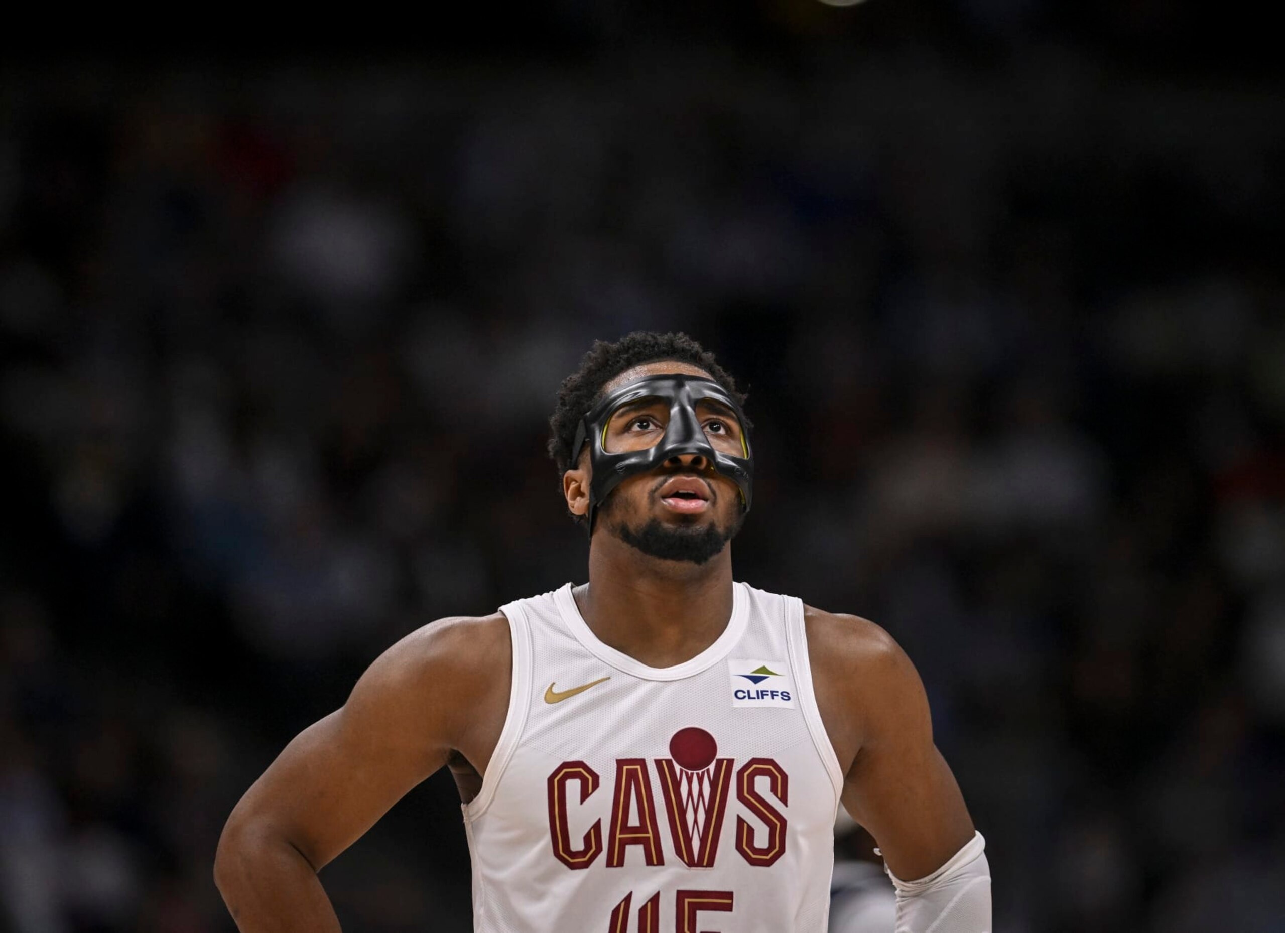 DENVER, CO - MARCH 31: Donovan Mitchell (45) of the Cleveland Cavaliers sports a mask during the second quarter against the Denver Nuggets at Ball Arena in Denver on Sunday, March 31, 2024. (Photo by AAron Ontiveroz/The Denver Post)