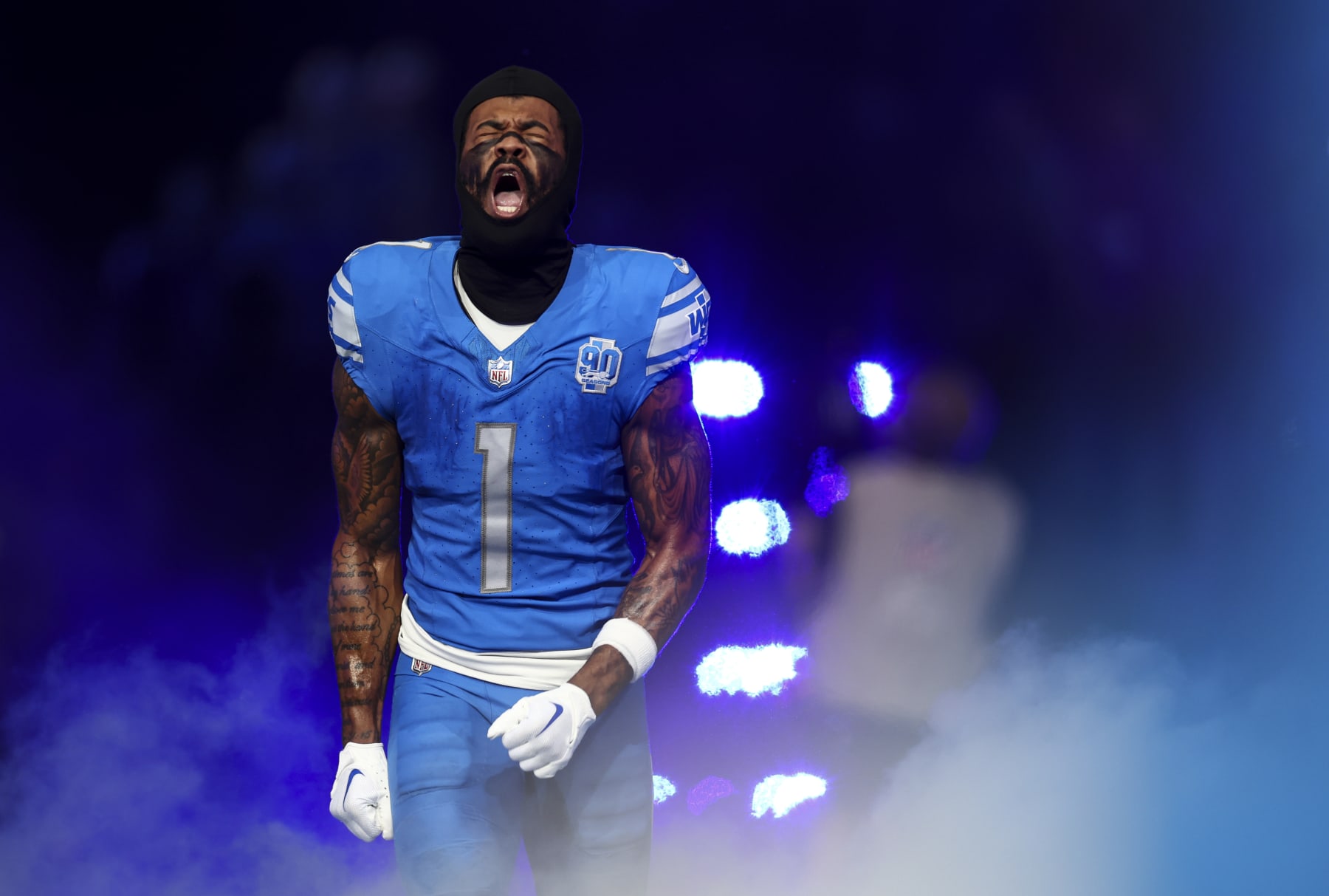 DETROIT, MI - JANUARY 21: Cameron Sutton #1 of the Detroit Lions runs onto the field prior to an NFL divisional round playoff football game against the Tampa Bay Buccaneers at Ford Field on January 21, 2024 in Detroit, Michigan. (Photo by Kevin Sabitus/Getty Images)