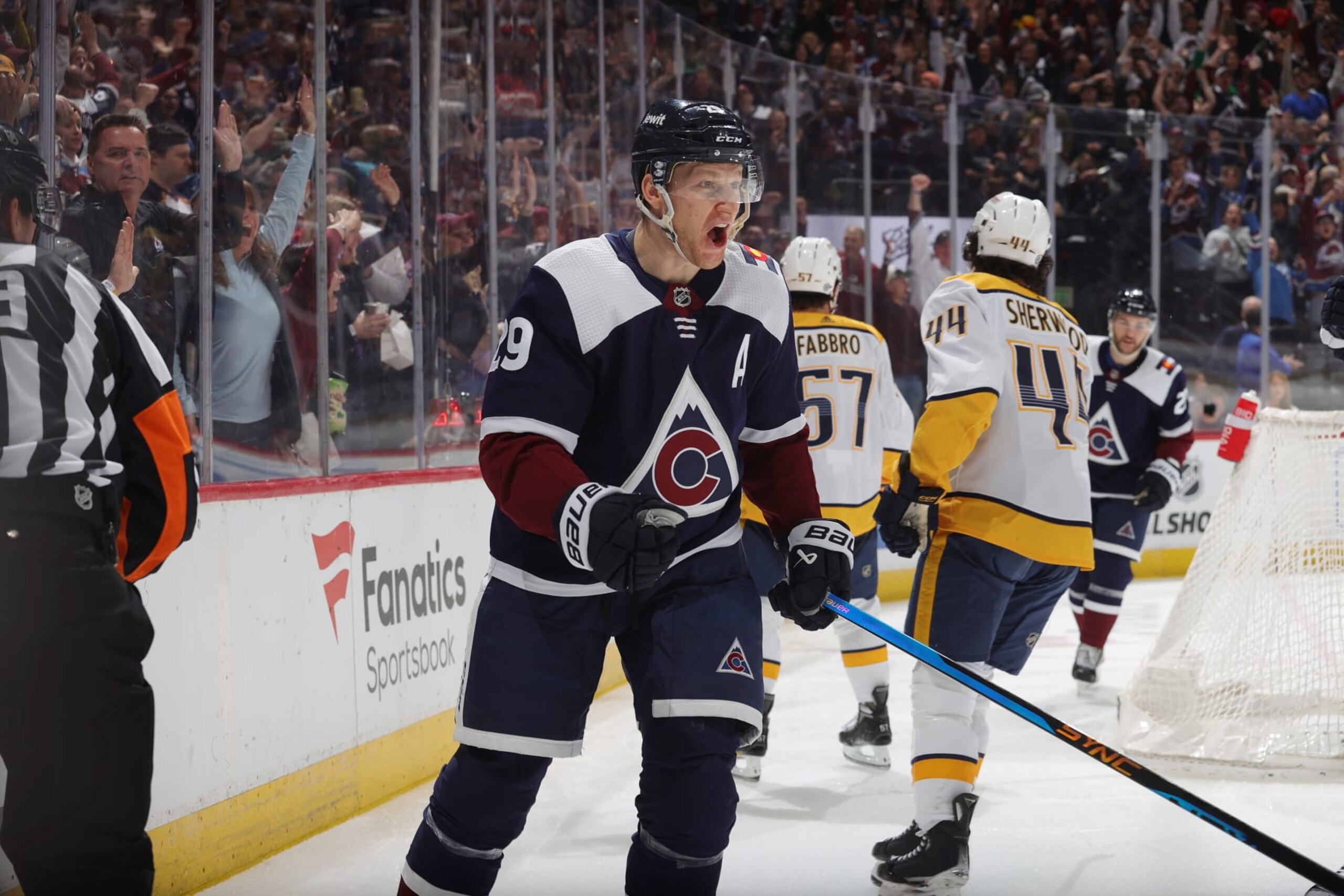 DENVER, COLORADO - MARCH 30: Nathan MacKinnon #29 of the Colorado Avalanche celebrates a goal against the Nashville Predators at Ball Arena on March 30, 2024 in Denver, Colorado. (Photo by Michael Martin/NHLI via Getty Images)
