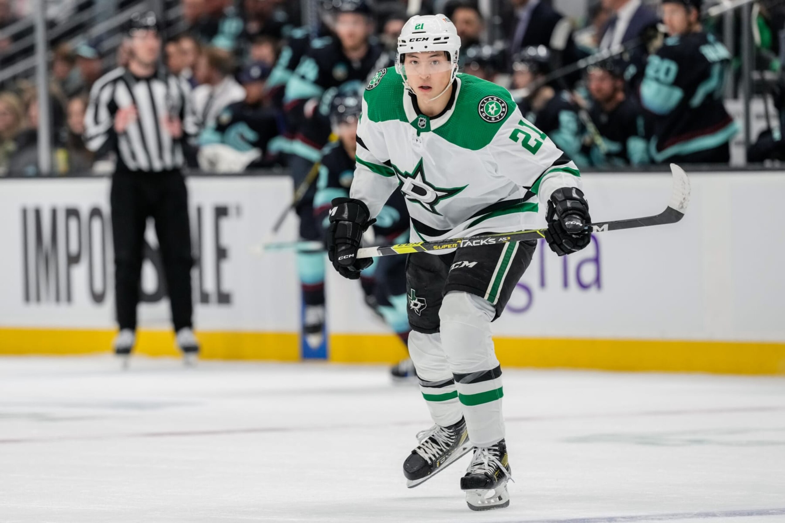 SEATTLE, WASHINGTON - MARCH 30: Jason Robertson #21 of the Dallas Stars skates during the first period of a game against the Seattle Kraken at Climate Pledge Arena on March 30, 2024 in Seattle, Washington. (Photo by Christopher Mast/NHLI via Getty Images)