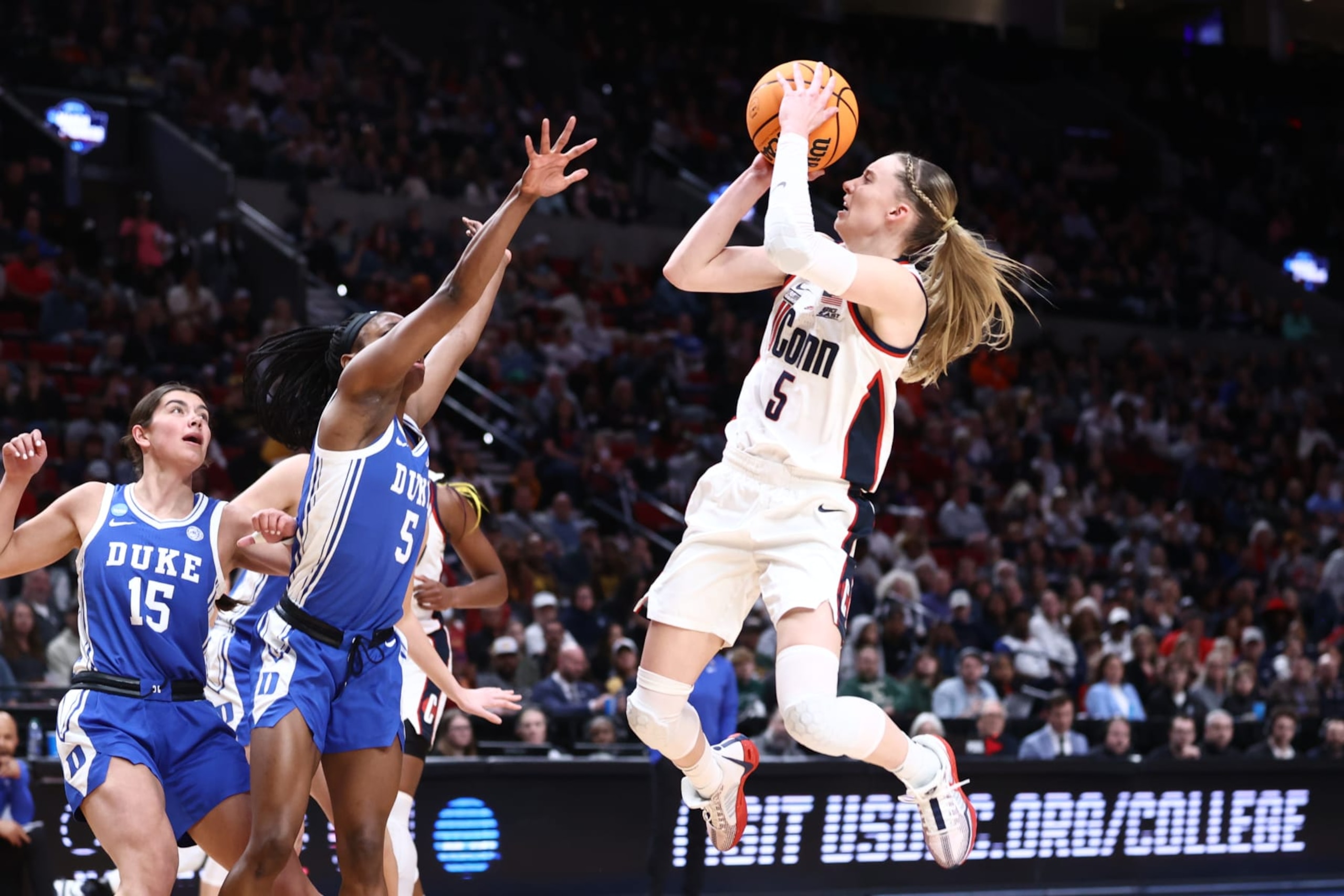 PORTLAND, OREGON - MARCH 30: Paige Bueckers #5 of the UConn Huskies shoots the ball during the first half of the game against the Duke Blue Devils during the Sweet Sixteen round of the 2024 NCAA Women's Basketball Tournament held at the Moda Center on March 30, 2024 in Portland, Oregon. (Photo by Tyler Schank/NCAA Photos via Getty Images)