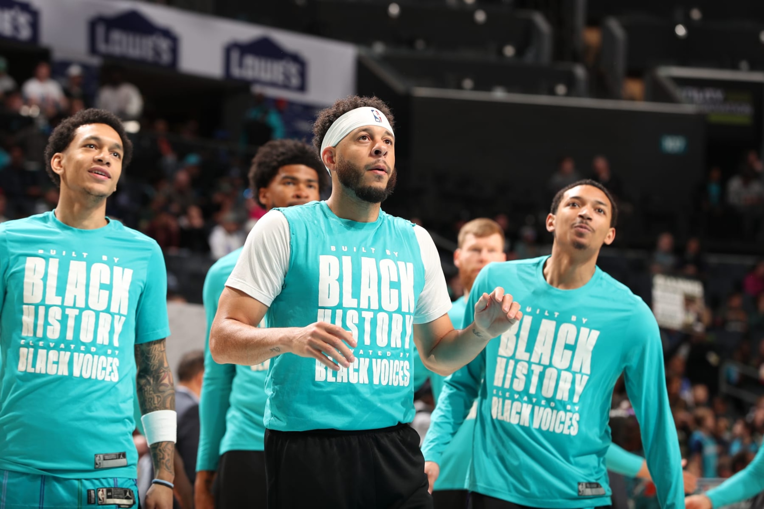Tre Mann, Seth Curry and Nick Smith Jr.