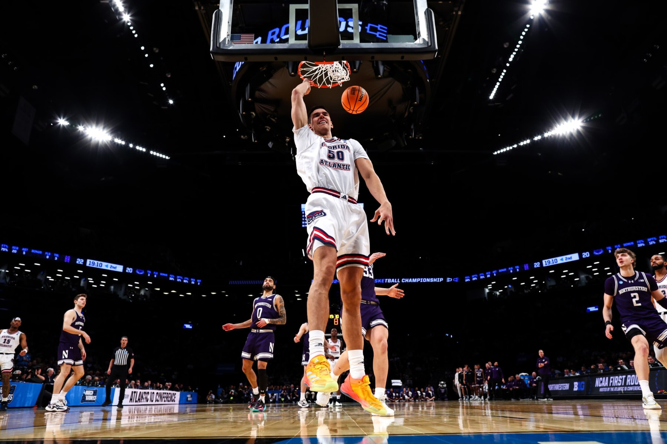 NEW YORK, NEW YORK - MARCH 22: Vladislav Goldin #50 of the Florida Atlantic Owls dunks the ball during the second half of the game against the Northwestern Wildcats during the first round of the NCAA Men’s Basketball Tournament at Barclays Center on March 22, 2024 in New York City. (Photo by Jamie Schwaberow/NCAA Photos via Getty Images) NEW YORK, NEW YORK - MARCH 22: Vladislav Goldin #50 of the Florida Atlantic Owls dunks the ball during the second half of the game against the Northwestern Wildcats during the first round of the NCAA Men’s Basketball Tournament at Barclays Center on March 22, 2024 in New York City. (Photo by Jamie Schwaberow/NCAA Photos via Getty Images)