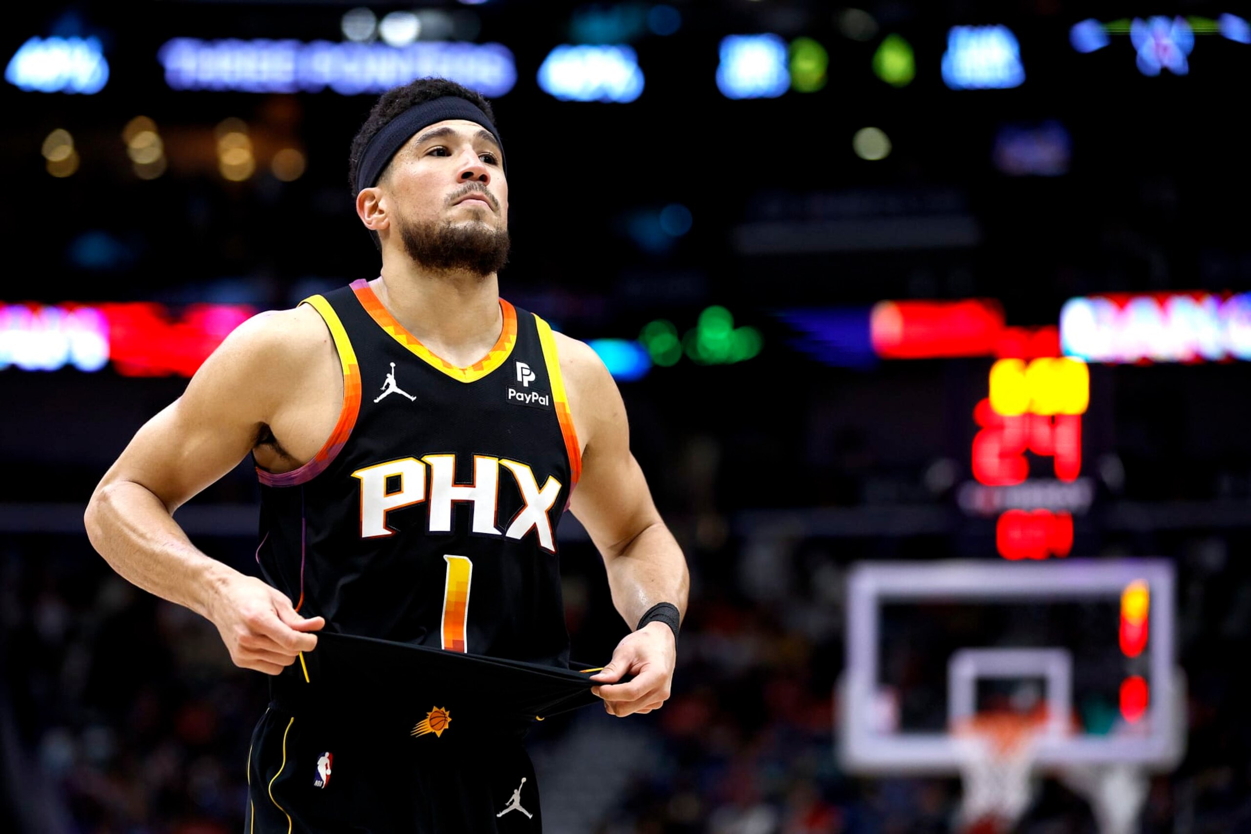 NEW ORLEANS, LOUISIANA - APRIL 01: Devin Booker #1 of the Phoenix Suns stands on the court during the fourth quarter of an NBA game against the New Orleans Pelicans at Smoothie King Center on April 01, 2024 in New Orleans, Louisiana. NOTE TO USER: User expressly acknowledges and agrees that, by downloading and or using this photograph, User is consenting to the terms and conditions of the Getty Images License Agreement. (Photo by Sean Gardner/Getty Images) NEW ORLEANS, LOUISIANA - APRIL 01: Devin Booker #1 of the Phoenix Suns stands on the court during the fourth quarter of an NBA game against the New Orleans Pelicans at Smoothie King Center on April 01, 2024 in New Orleans, Louisiana. NOTE TO USER: User expressly acknowledges and agrees that, by downloading and or using this photograph, User is consenting to the terms and conditions of the Getty Images License Agreement. (Photo by Sean Gardner/Getty Images)