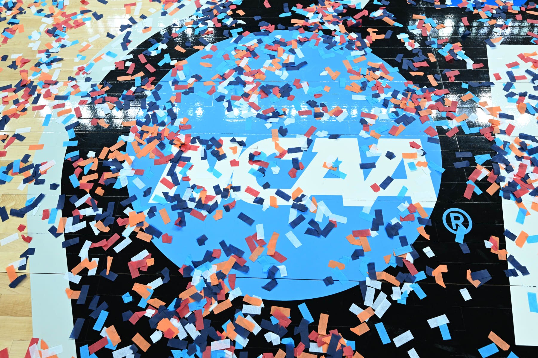 ALBANY, NEW YORK - MARCH 31: The NCAA logo is covered by confetti after the South Carolina Gamecocks defeat the Oregon State Beavers during the Elite Eight round of the 2024 NCAA Women's Basketball Tournament held at MVP Arena on March 31, 2024 in Albany, New York. (Photo by Greg Fiume/NCAA Photos via Getty Images)