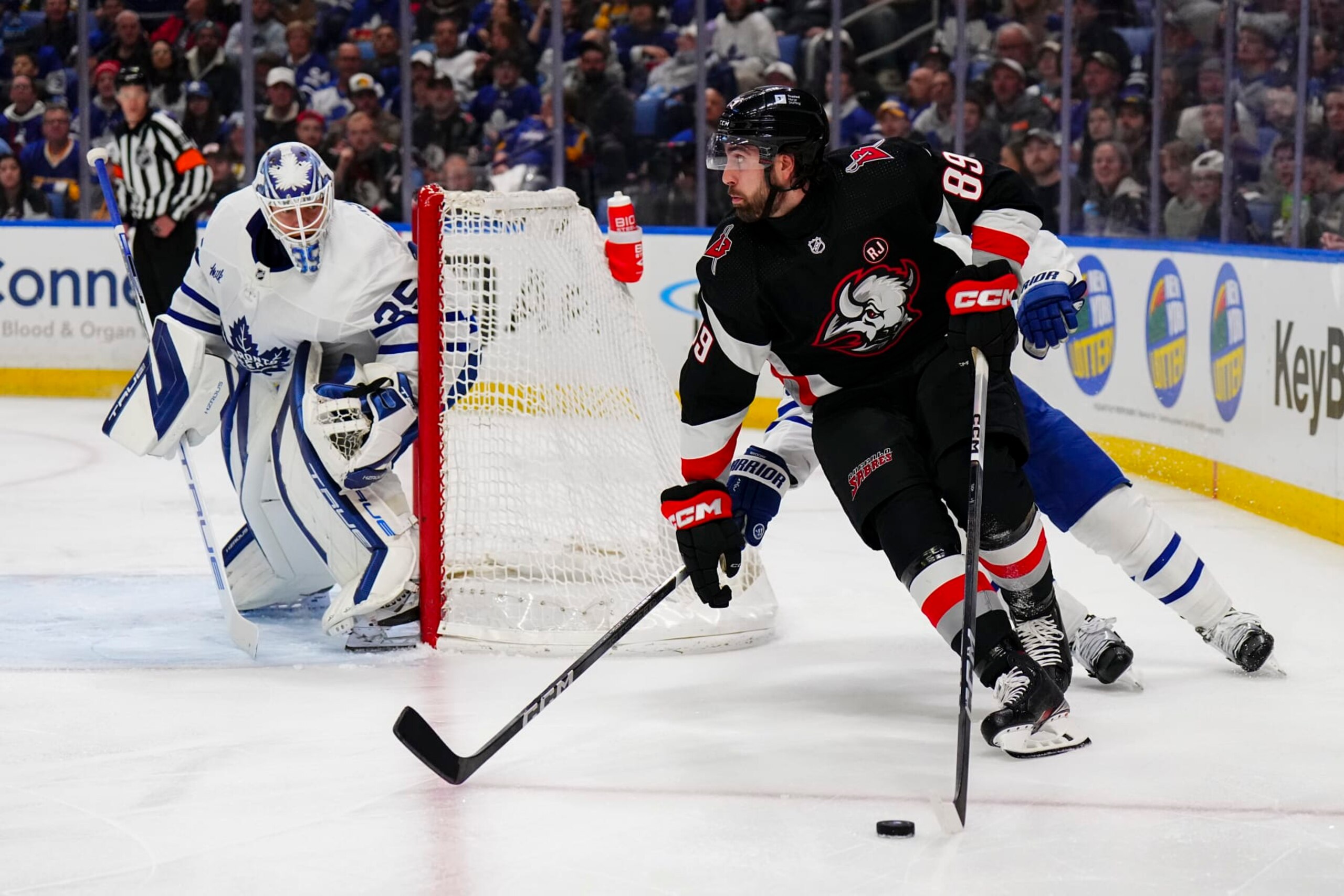 BUFFALO, NEW YORK - MARCH 30: Alex Tuch #89 of the Buffalo Sabres wraps around the net during an NHL game against the Toronto Maple Leafs on March 30, 2024 at KeyBank Center in Buffalo, New York. (Photo by Ben Ludeman/NHLI via Getty Images) BUFFALO, NEW YORK - MARCH 30: Alex Tuch #89 of the Buffalo Sabres wraps around the net during an NHL game against the Toronto Maple Leafs on March 30, 2024 at KeyBank Center in Buffalo, New York. (Photo by Ben Ludeman/NHLI via Getty Images)