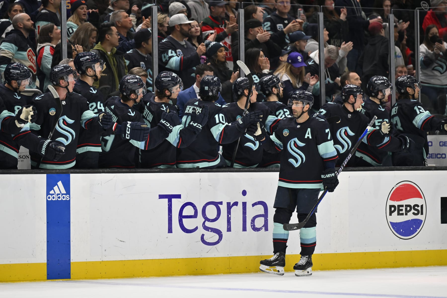 SEATTLE, WASHINGTON - MARCH 26: Jordan Eberle #7 of the Seattle Kraken celebrates with teammates after scoring during the first period against the Anaheim Ducks at Climate Pledge Arena on March 26, 2024 in Seattle, Washington. (Photo by Alika Jenner/Getty Images)