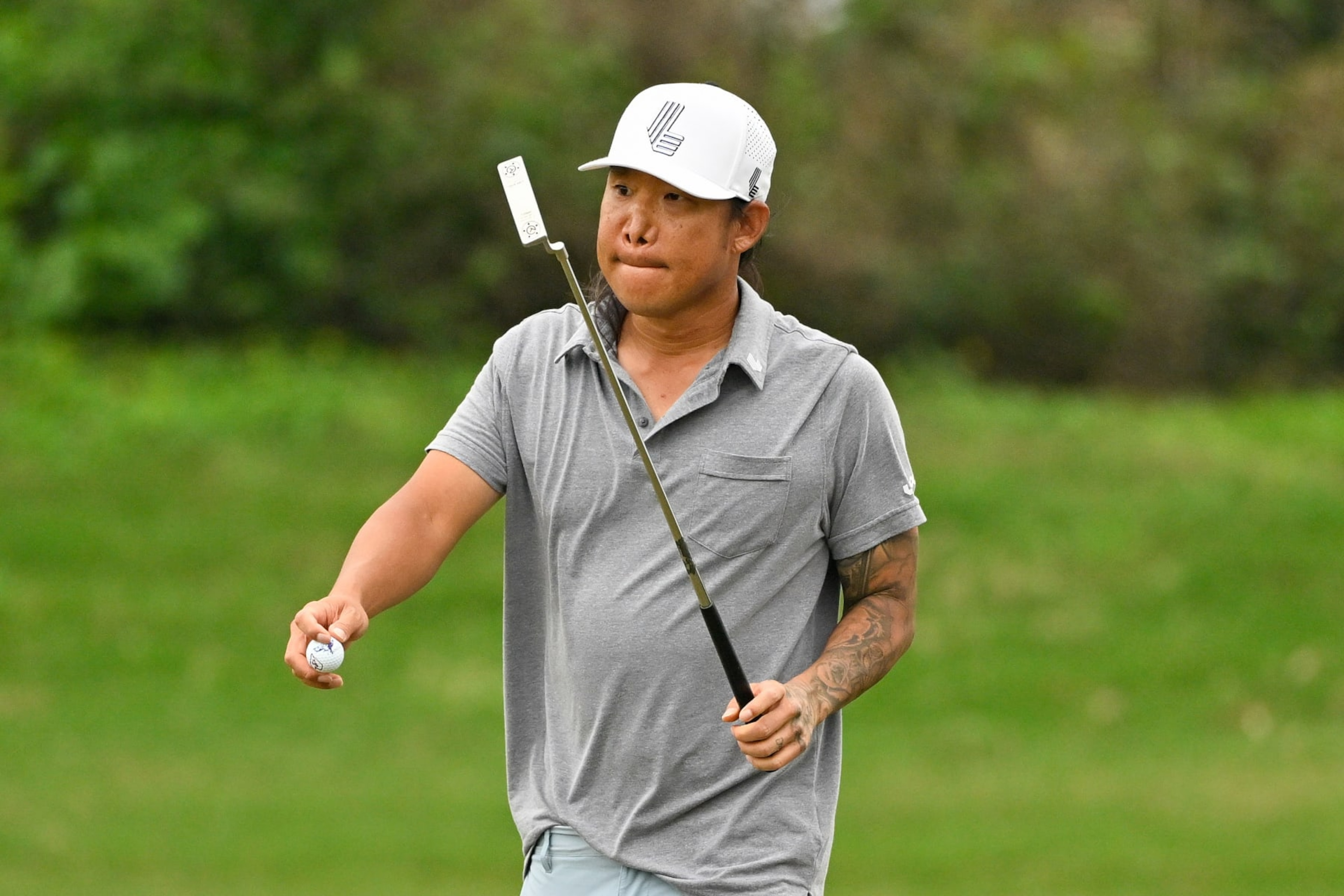 MACAU, CHINA - MARCH 15: Anthony Kim of the United States reacts after putting on hole 3 during the second round of International Series Macau at Macau Golf and Country Club on March 15, 2024 in Macau, China.  (Photo by Jason Butler/Getty Images)