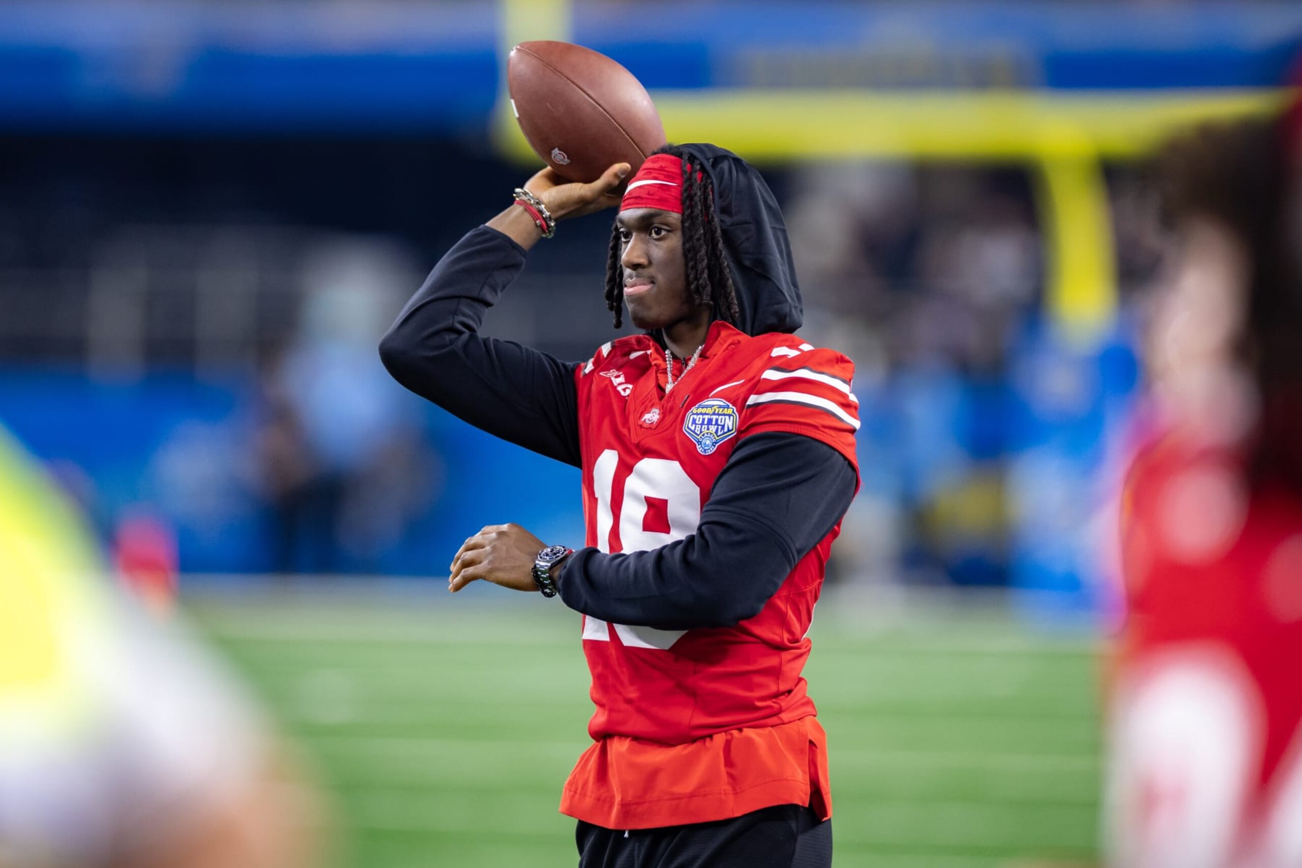 ARLINGTON, TX - DECEMBER 29: Ohio State Buckeyes wide receiver Marvin Harrison Jr. (#18) throws a pass on the sideline during the Goodyear Cotton Bowl Classic football game between the Ohio State Buckeyes and Missouri Tigers on December 29, 2023 at AT&T Stadium in Arlington, TX.  (Photo by Matthew Visinsky/Icon Sportswire via Getty Images)