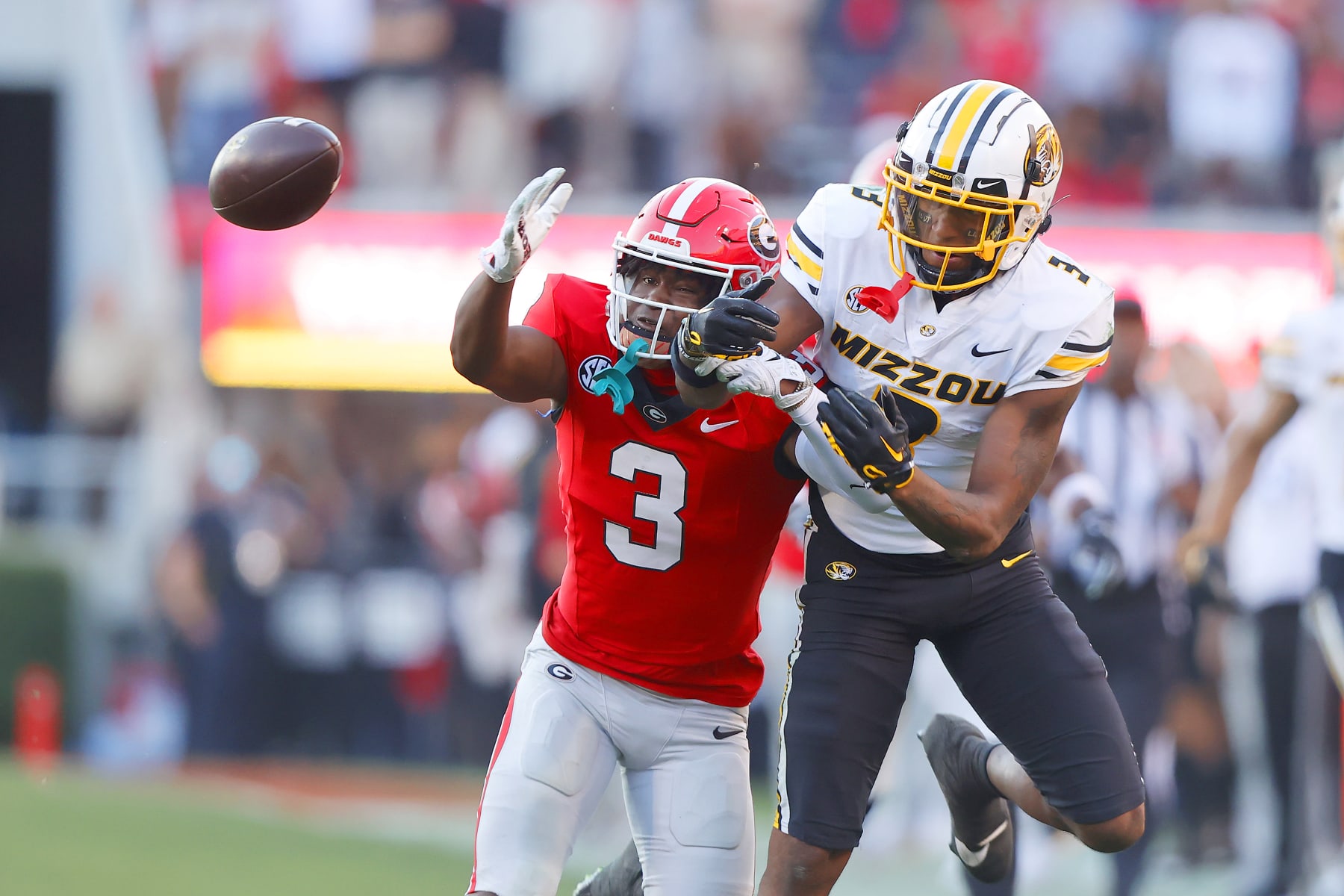 ATHENS, GA - NOVEMBER 04: Georgia Bulldogs defensive back Kamari Lassiter (3) breaks up the intended pass to Missouri Tigers wide receiver Luther Burden III (3) during the Saturday afternoon college football game between the Georgia Bulldogs and the Missouri Tigers on November 4, 2023 at Sanford Stadium in Athens, GA.   (Photo by David J. Griffin/Icon Sportswire via Getty Images)