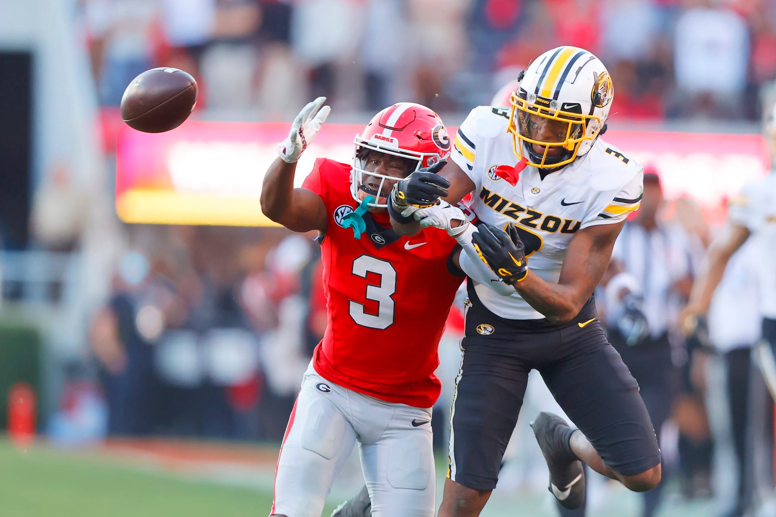 ATHENS, GA - NOVEMBER 04: Georgia Bulldogs defensive back Kamari Lassiter (3) breaks up the intended pass to Missouri Tigers wide receiver Luther Burden III (3) during the Saturday afternoon college football game between the Georgia Bulldogs and the Missouri Tigers on November 4, 2023 at Sanford Stadium in Athens, GA. (Photo by David J. Griffin/Icon Sportswire via Getty Images) ATHENS, GA - NOVEMBER 04: Georgia Bulldogs defensive back Kamari Lassiter (3) breaks up the intended pass to Missouri Tigers wide receiver Luther Burden III (3) during the Saturday afternoon college football game between the Georgia Bulldogs and the Missouri Tigers on November 4, 2023 at Sanford Stadium in Athens, GA. (Photo by David J. Griffin/Icon Sportswire via Getty Images)